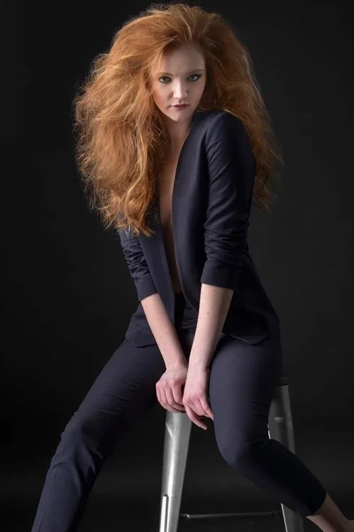Redhead model on chair