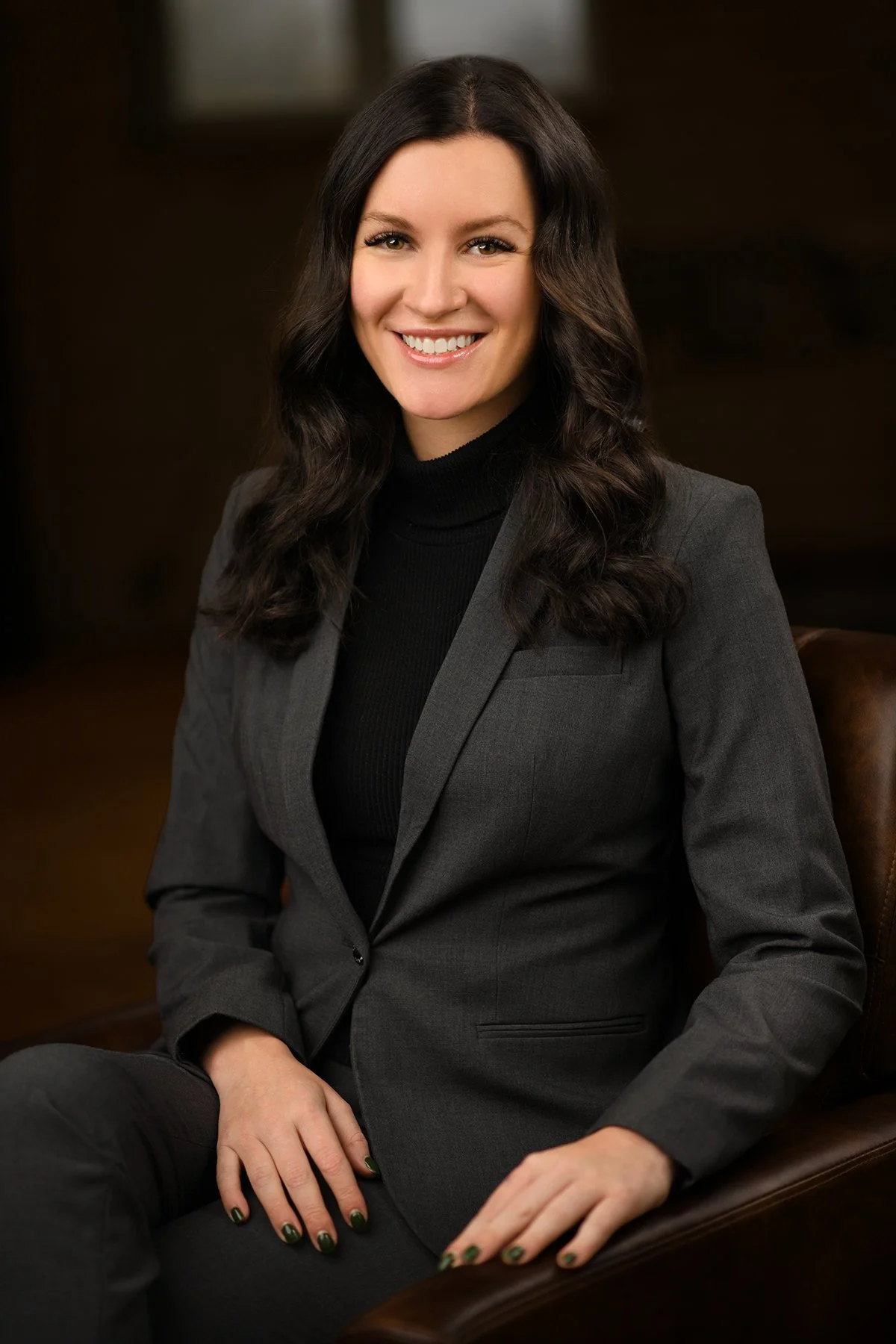 Womans headshot sitting down

 

 relaxed Woman's headshot sitting in a leather chair 
