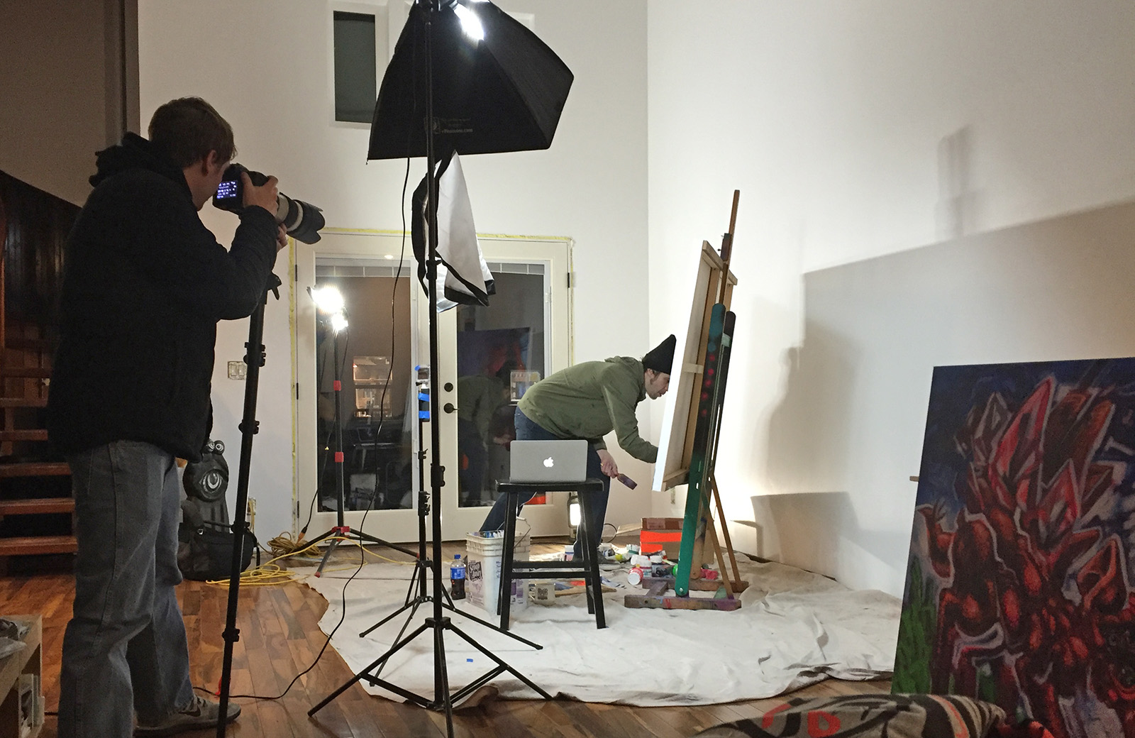 Behind the Scenes - Matt French painting a portrait inside the house. It was cool to see the progression of the piece come alive throughout the night. Awesome work Matt! / photo: JJ