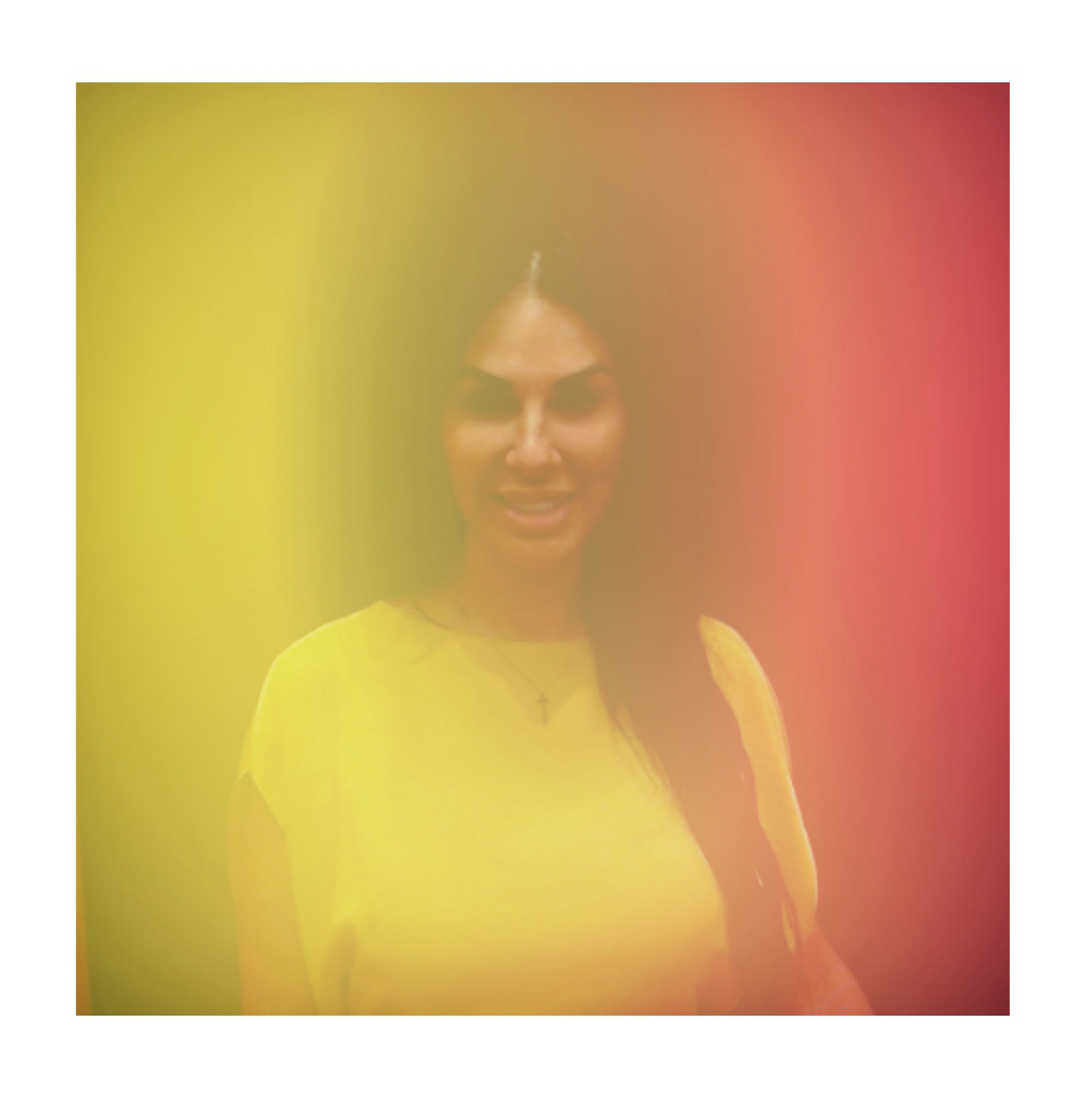 Aura portrait of a guest in a yellow and red glow, Fox & Darling aura photo booth