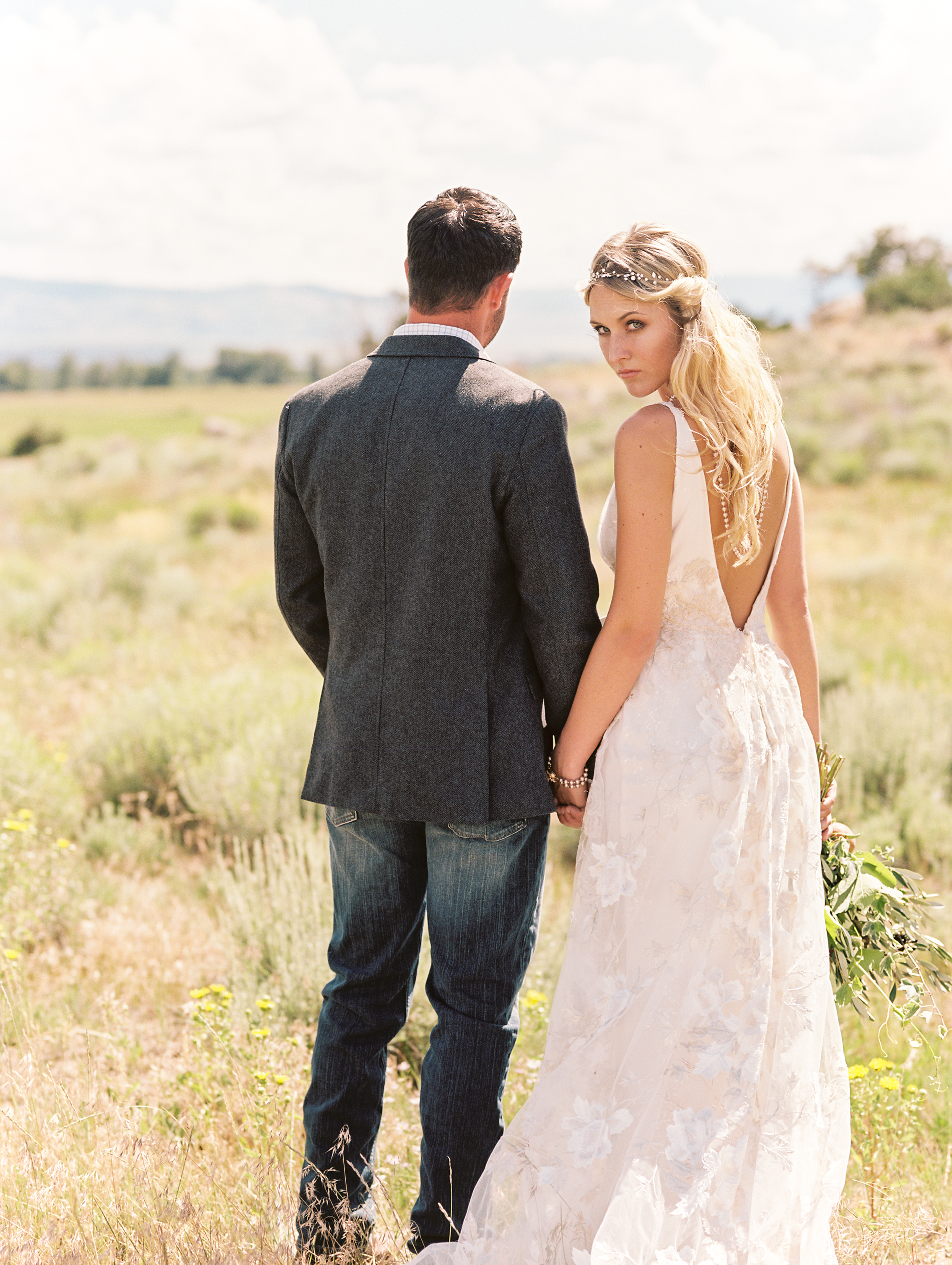 Bohemian Wedding Inspiration at Brush Creek Ranch | Claire Pettibone Raven gown from Little White Dress Bridal Shop | Photography: Lisa O'Dwyer