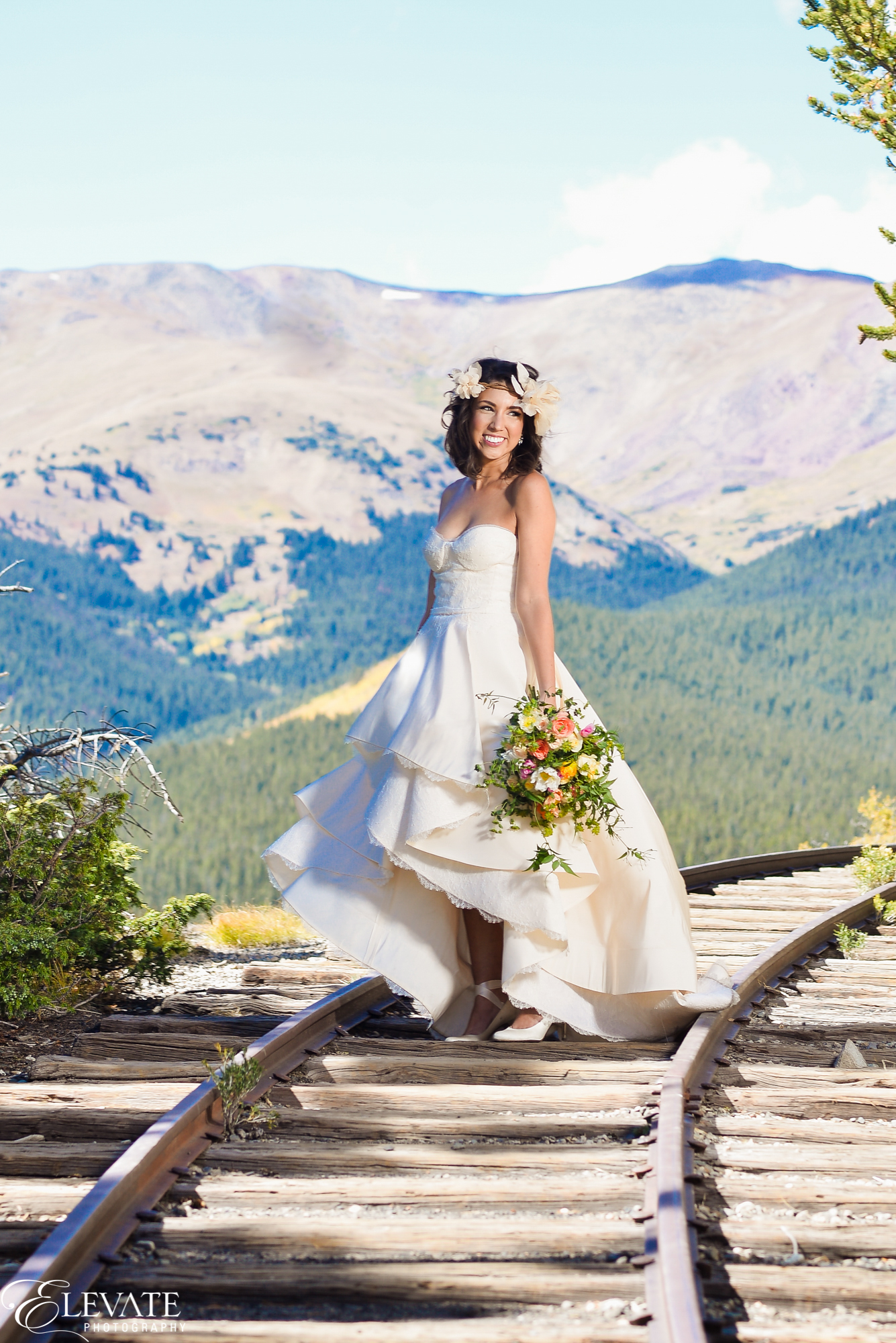  Fall wedding in Breckenridge | RIVINI Martini gown from Little White Dress Bridal Shop | Elevate Photography 