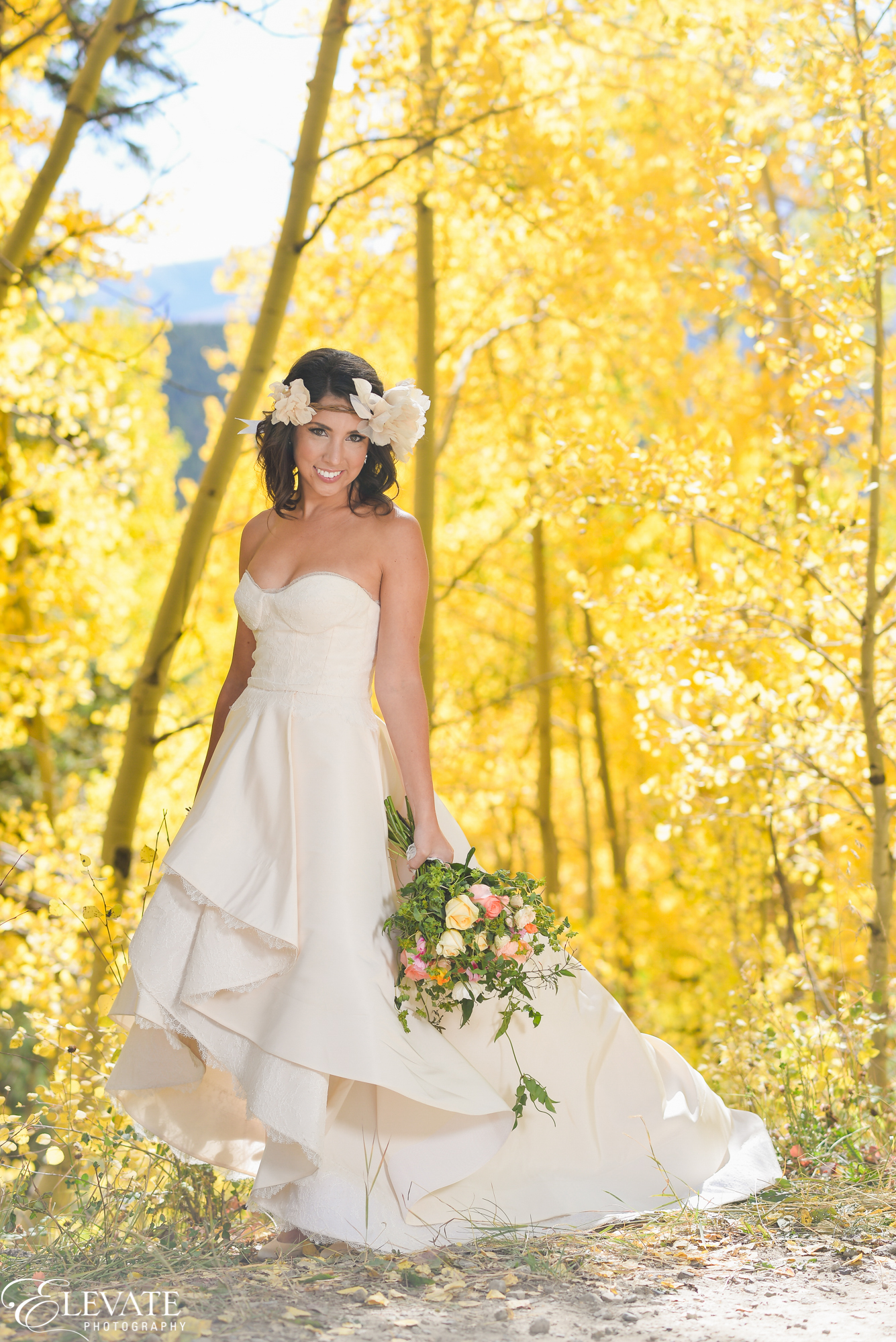 Fall wedding in Breckenridge | RIVINI Martini gown from Little White Dress Bridal Shop | Elevate Photography