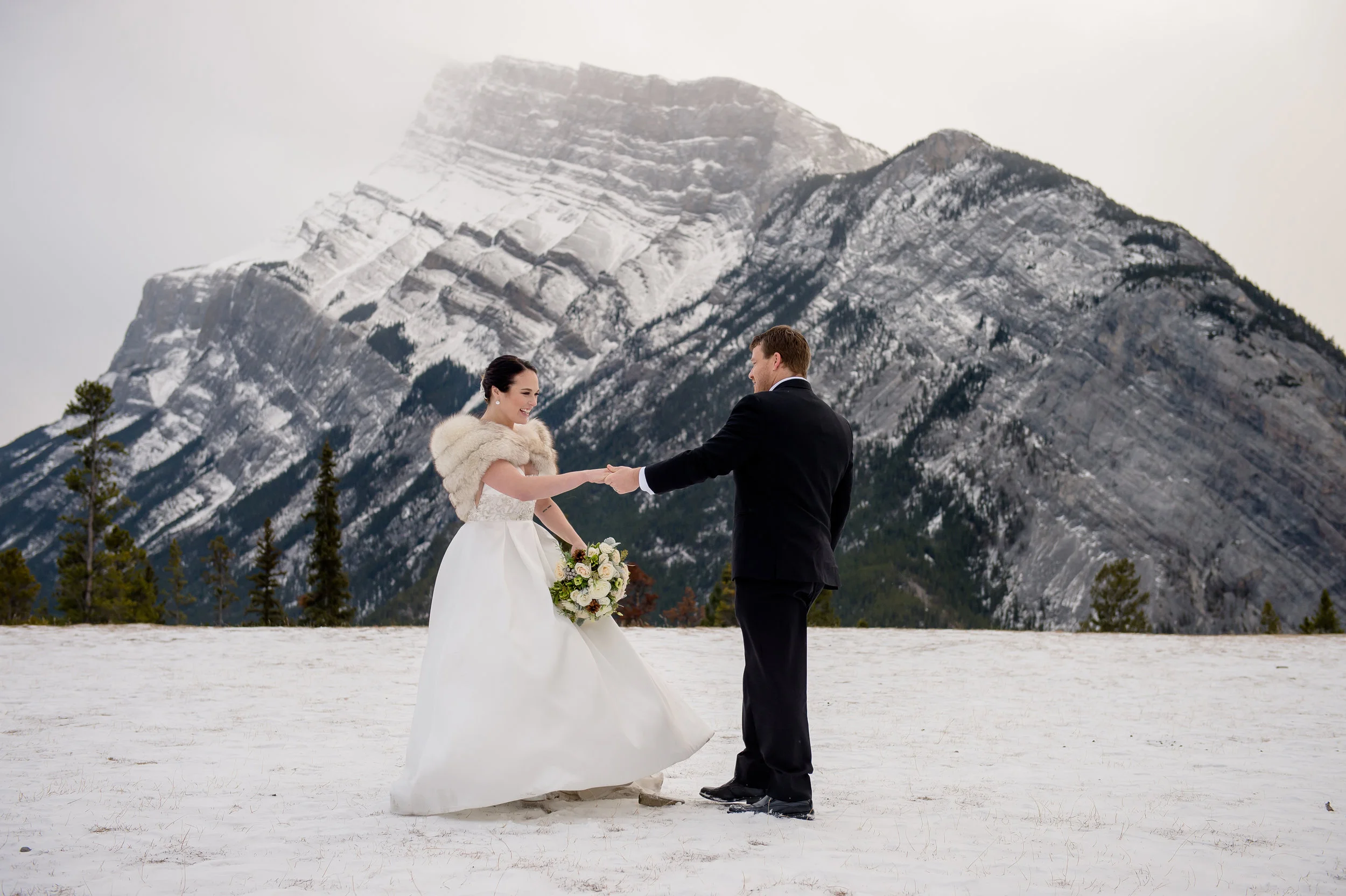 Winter wedding in Banff, Canada | Anne Barge Harlequin gown from Little White Dress in Denver, Colorado | Orange Girl Photography