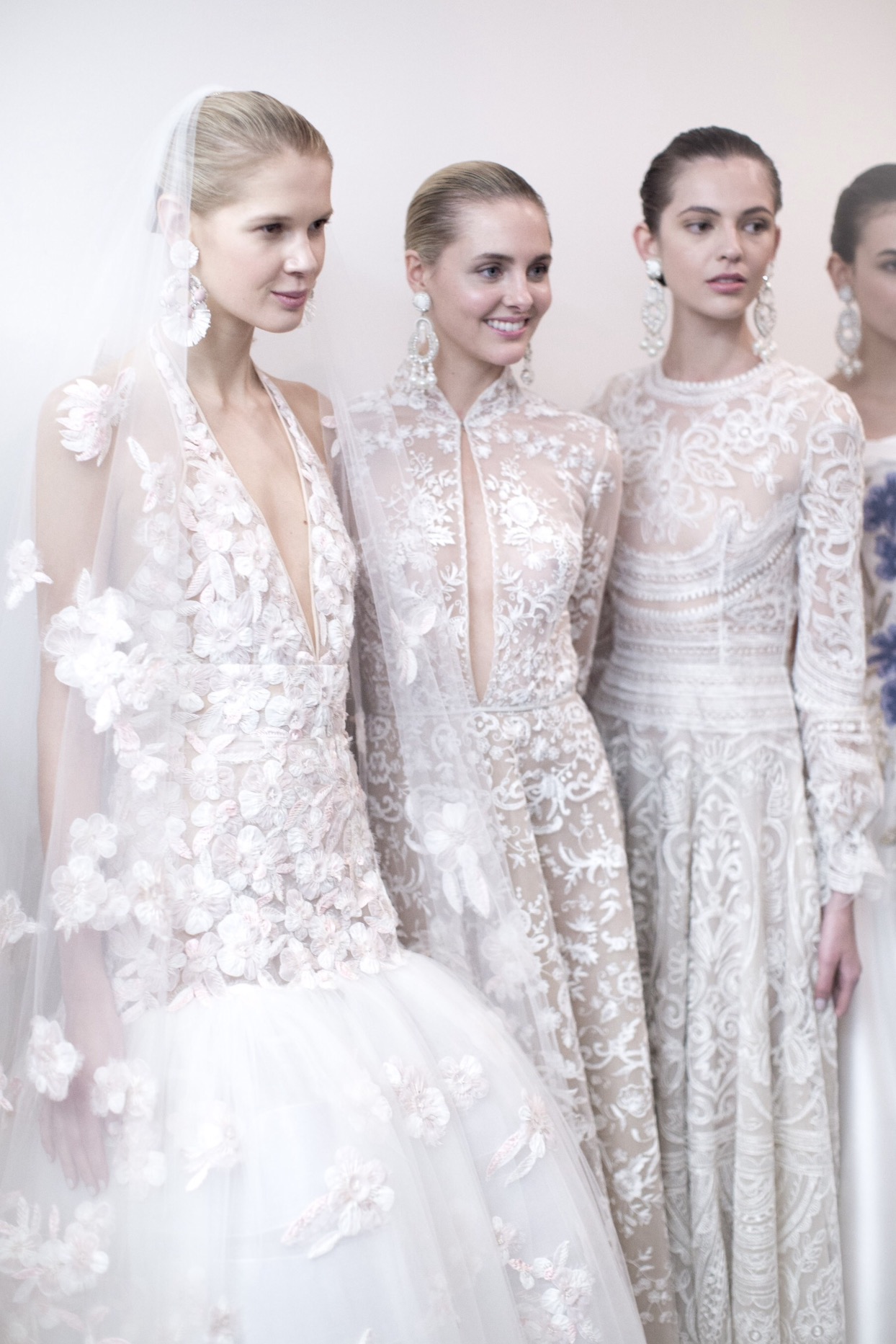  High-end, handmade wedding gowns by Naeem Khan available at Little White Dress Bridal Shop in Denver, Colorado. 