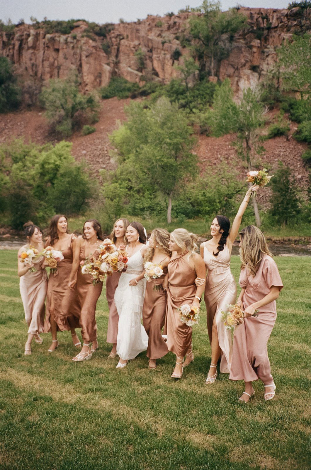  miss-matched bridesmaids rust gown terracotta dresses  
