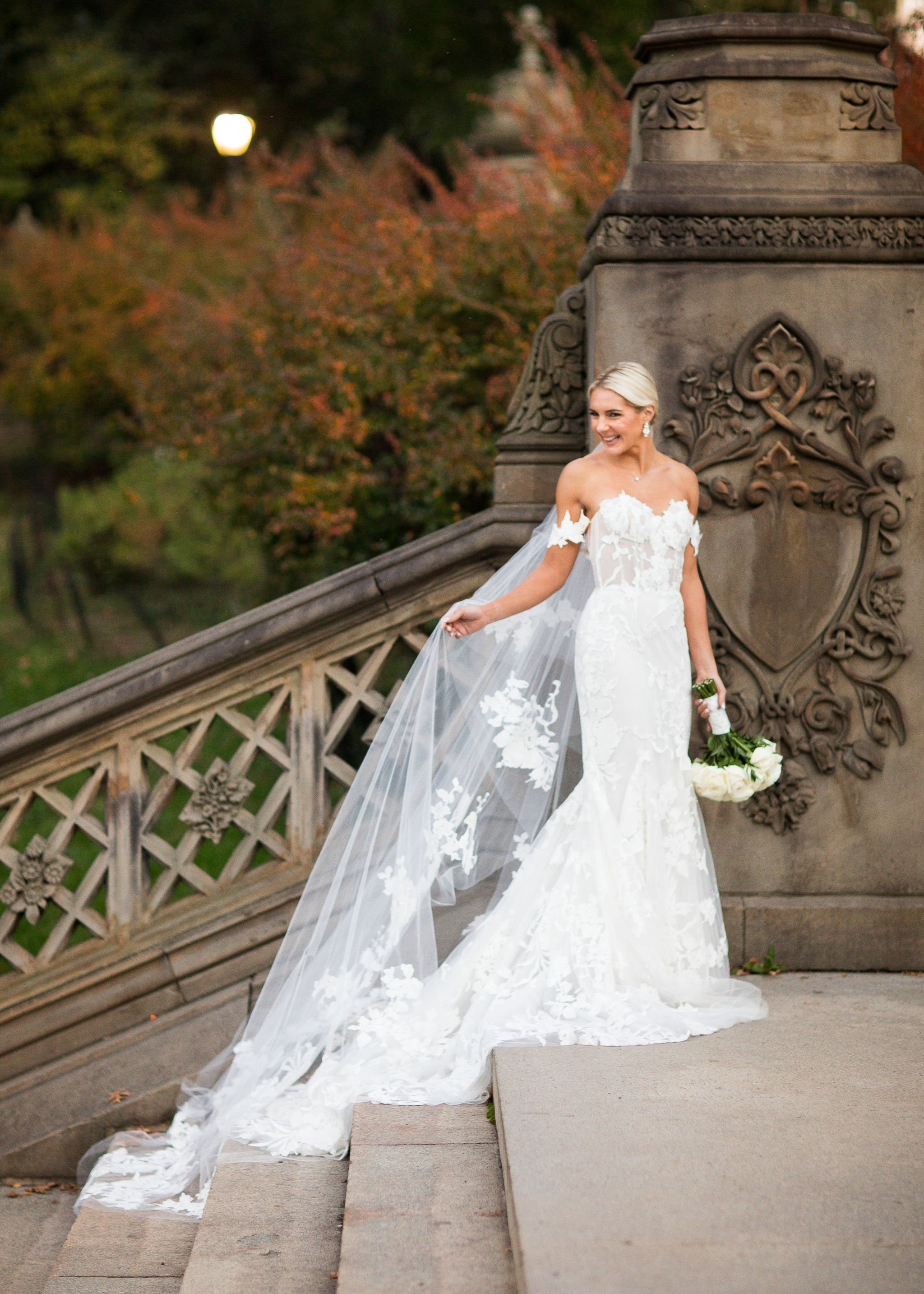  monique lhuillier dramatic veil central park wedding off the shoulder gown  