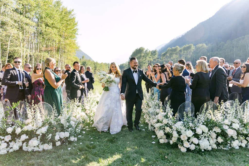 white florals aspen wedding outdoor ceremony colorado strapless gown carolina herrera  