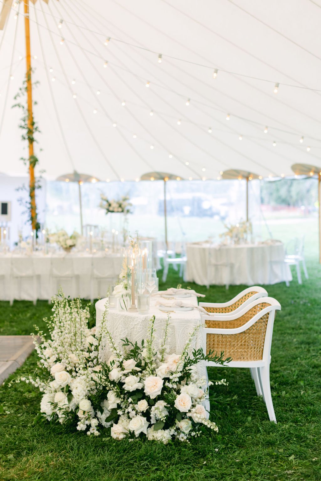  white florals tented reception aspen wedding outdoors 