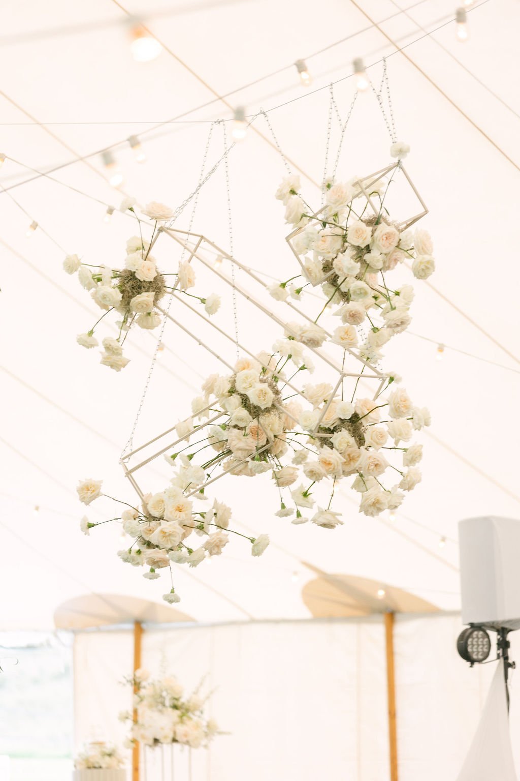  floral chandelier white roses center piece tent reception  