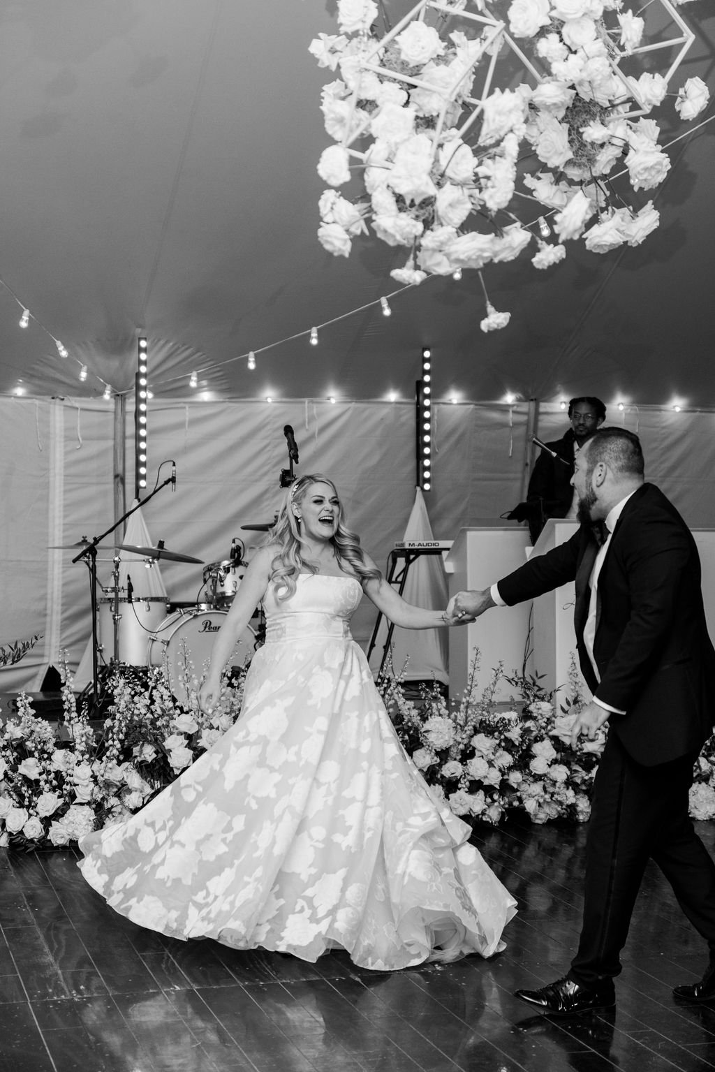  outdoor wedding first dance tent reception caolina herrera strapless gown white florals  