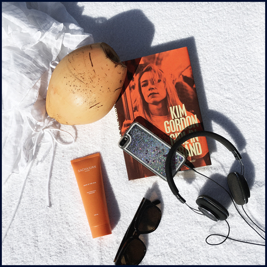 Pool side essentials: Loup Charmant cover-up, Sachajuan Hair In The Sun, Céline sunglasses, Girl in a Band: A Memoir by Kim Gordon, Bowers & Wilkins headphones