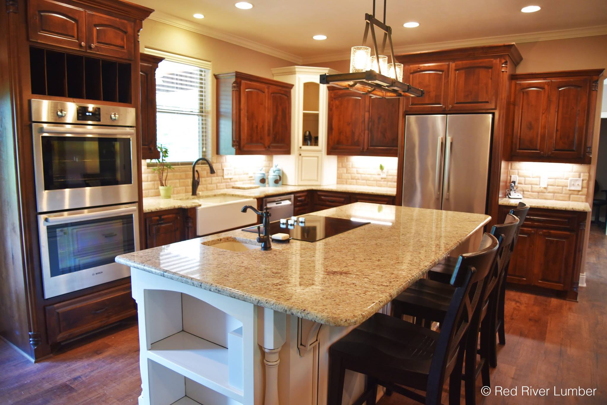  We supplied cabinet materials,&nbsp; Bosch Home &nbsp;Appliances, fabricated/installed the Giudoni Ornamental Granite Countertops, and supplied the luxury vinyl plank flooring. 