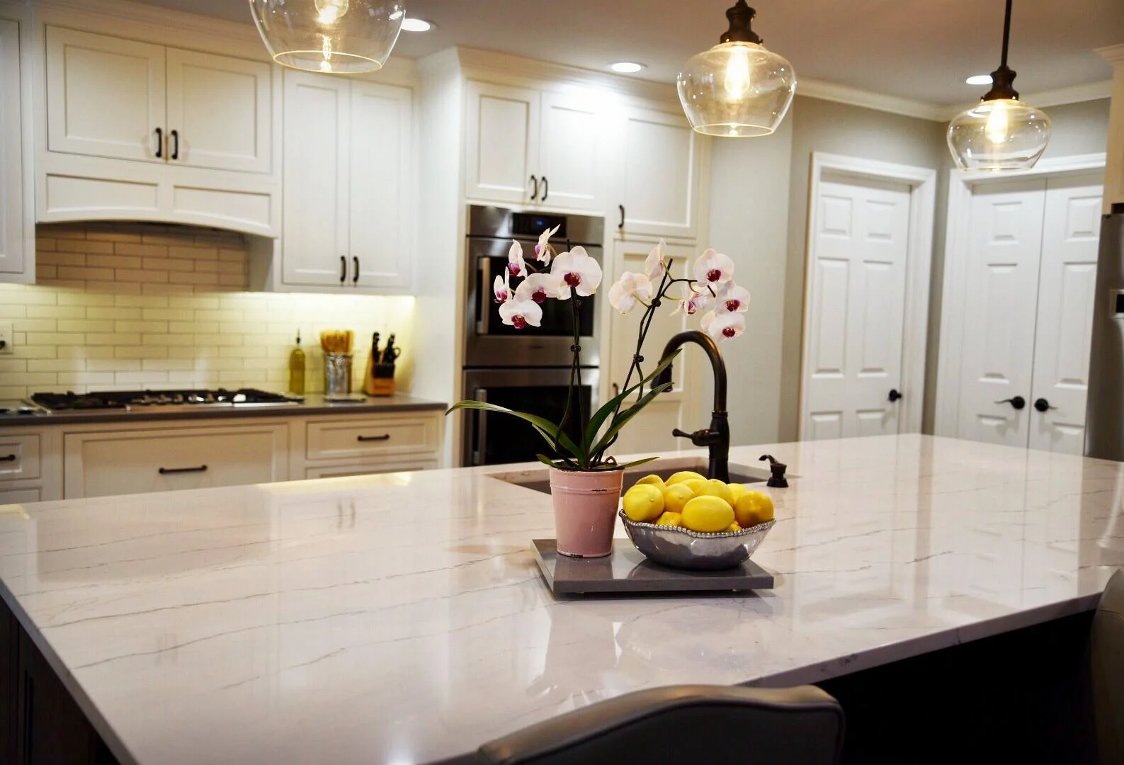 Cambria Countertops, Shiloh Cabinetry, Bosch Home Appliances, Masonite Doors , Karndean Flooring , and Coronado Stone Products make this local project a real treat for us to showcase.