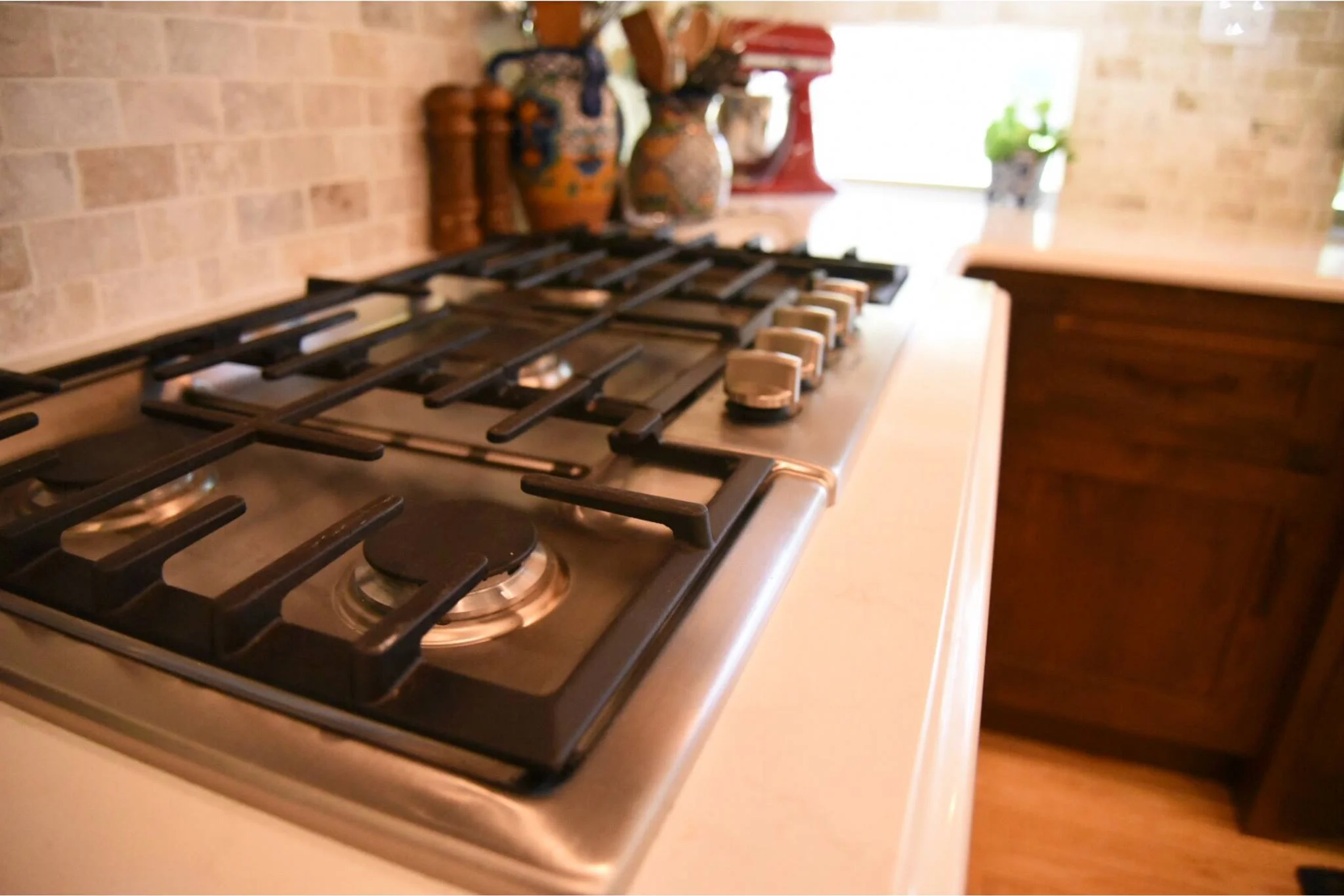 We supplied the Shiloh cabinetry, quartz countertops, tile backsplash, Bosch appliances, Hoshizaki ice maker, and Soci sink.