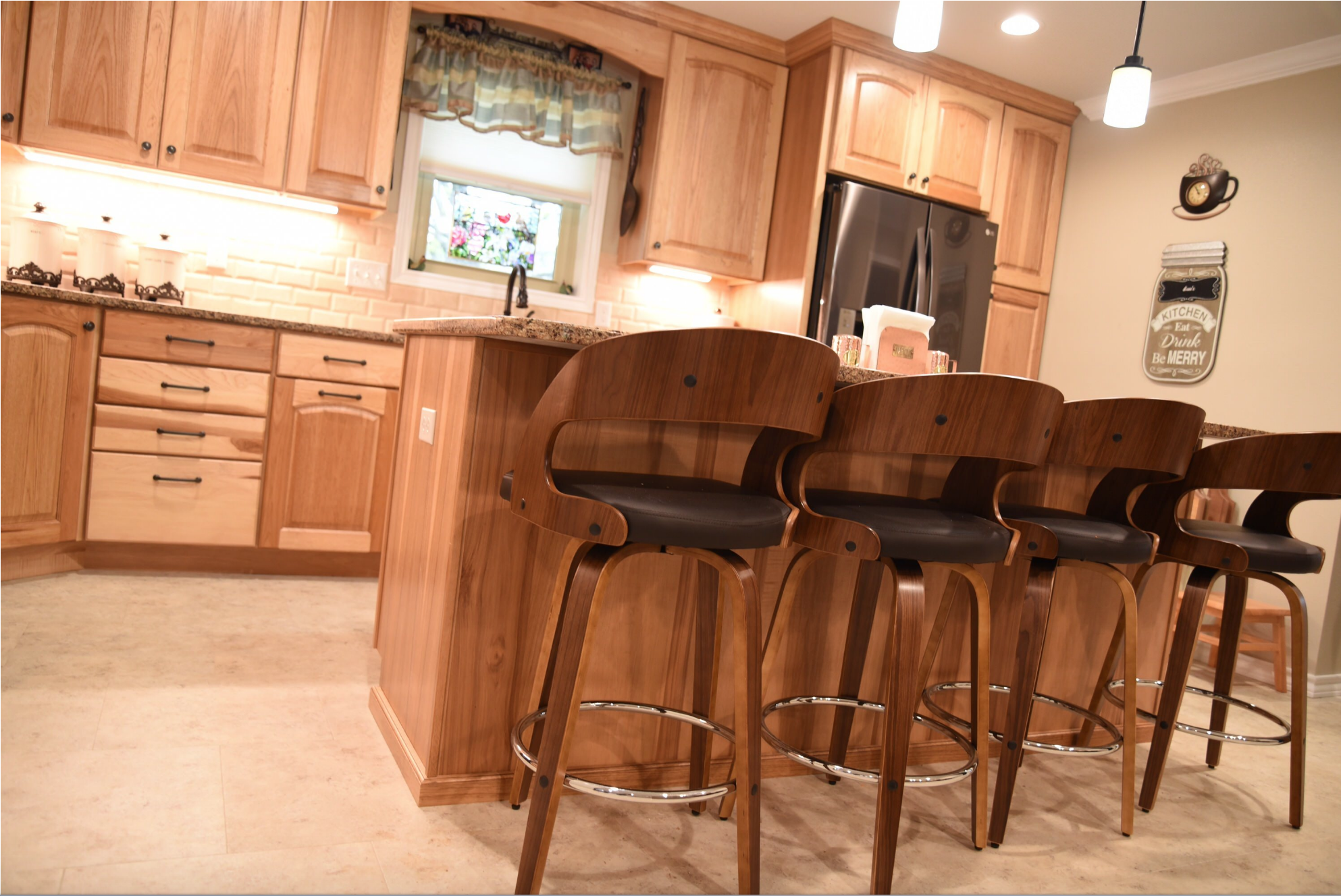 MidContinent Cabinetry , Cambria Quartz countertops , 3x6 Mexican Travertine tile, and a Soci sink are included in this kitchen project.