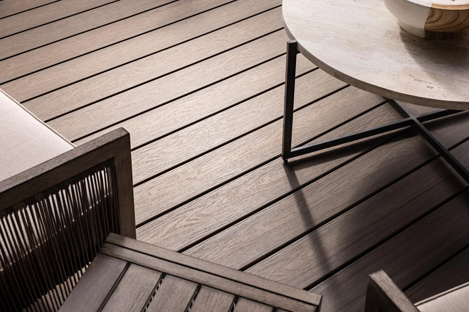 Bring the beauty of tropical hardwood to your backyard with MoistureShield Elevate Composite Decking in Riverbank.  This rich, multi-toned brown finish offers the warmth of natural wood with the durability of composite. Built with Solid Core technolo