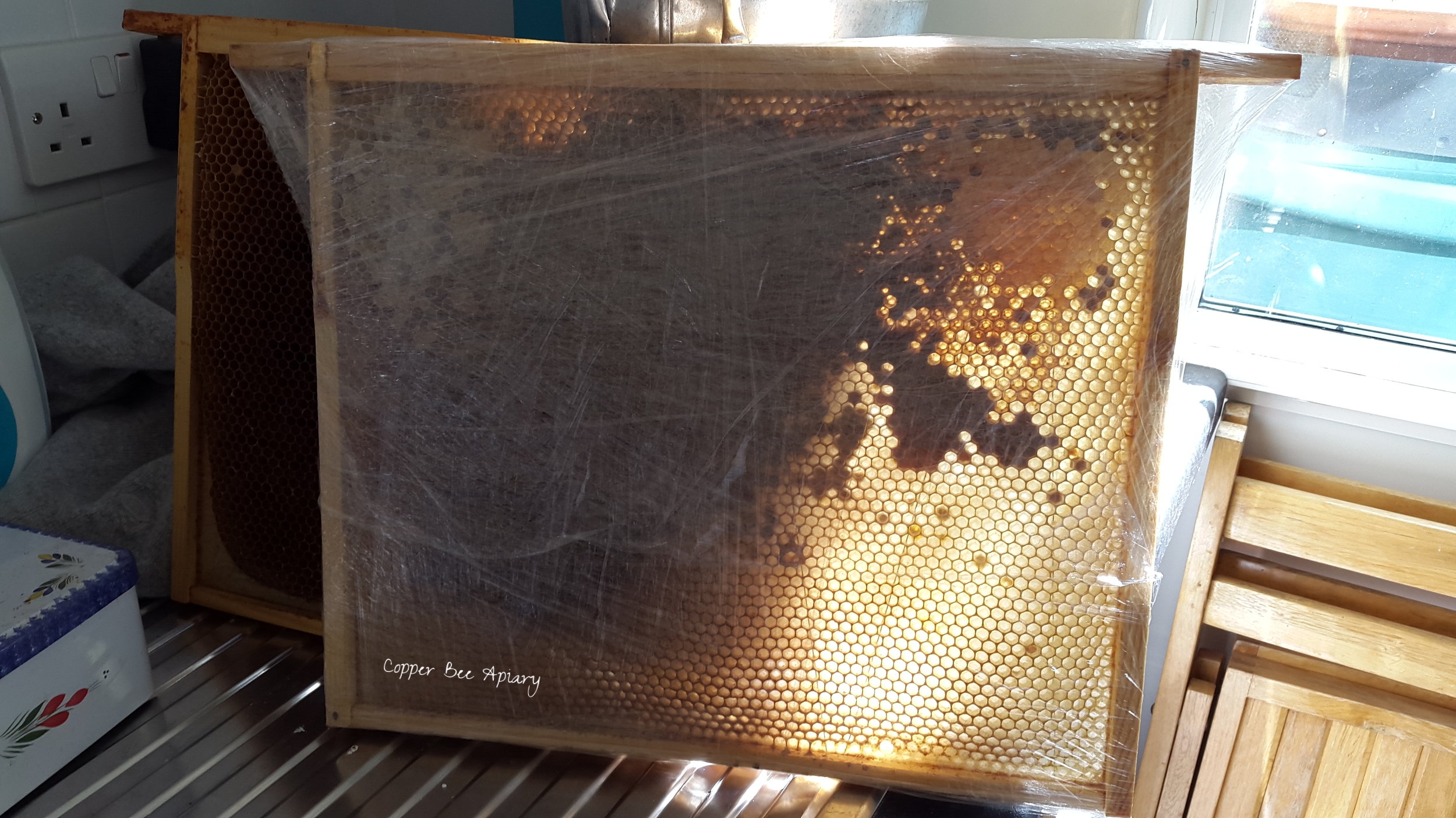 Frame wrapped in cling film