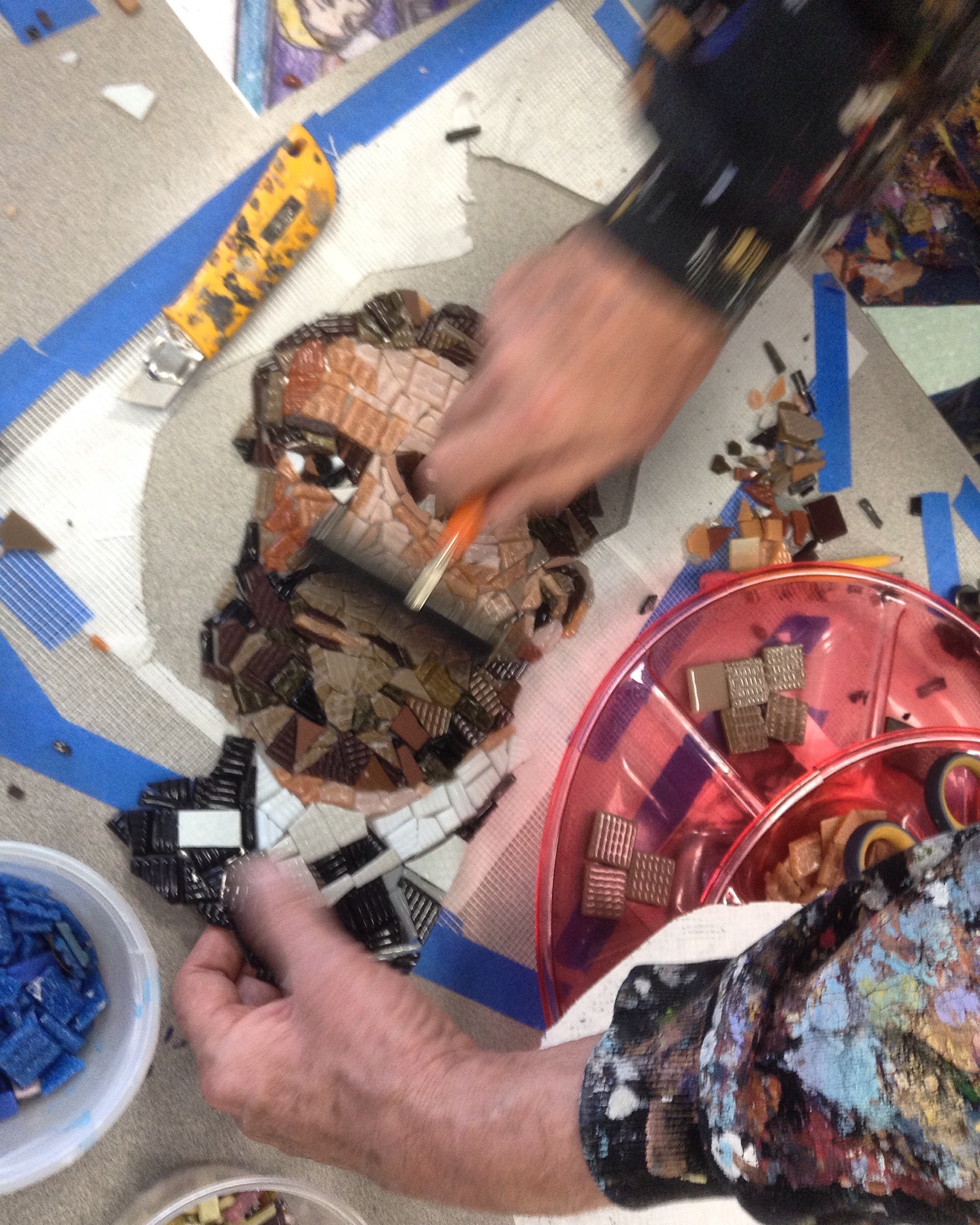 Brayering the back side of the mosaic.