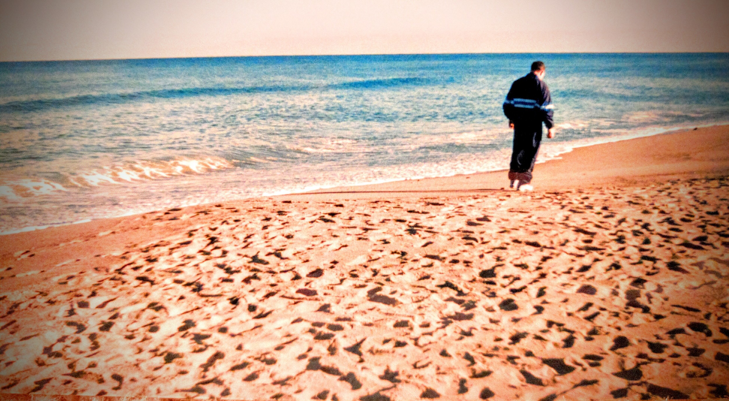 Coach Oles walking the beach at Cape Cod (circa 1998 or 1999) after having the team stop to take in the view as well as learn the history of nearby Marconi Station. Very typical of Coach: fencing is about working with your team and learning alongside them, on the strip and off.