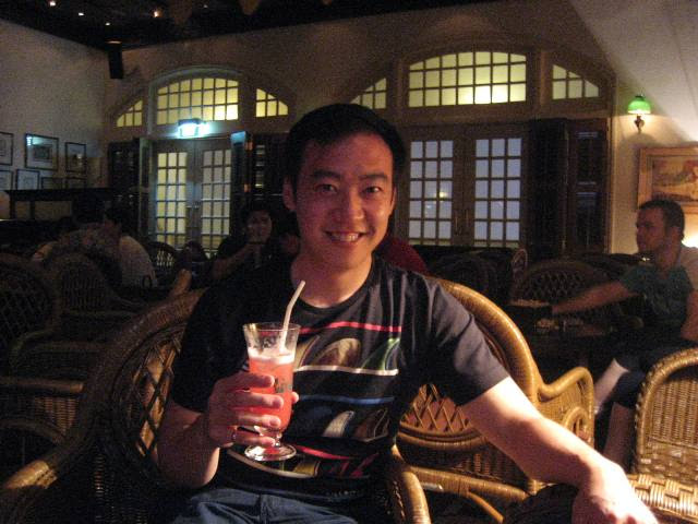 Celebrating a day in the sea like a proper tourist should: in the Long Bar of The Raffles Hotel, home of the Singapore Sling.