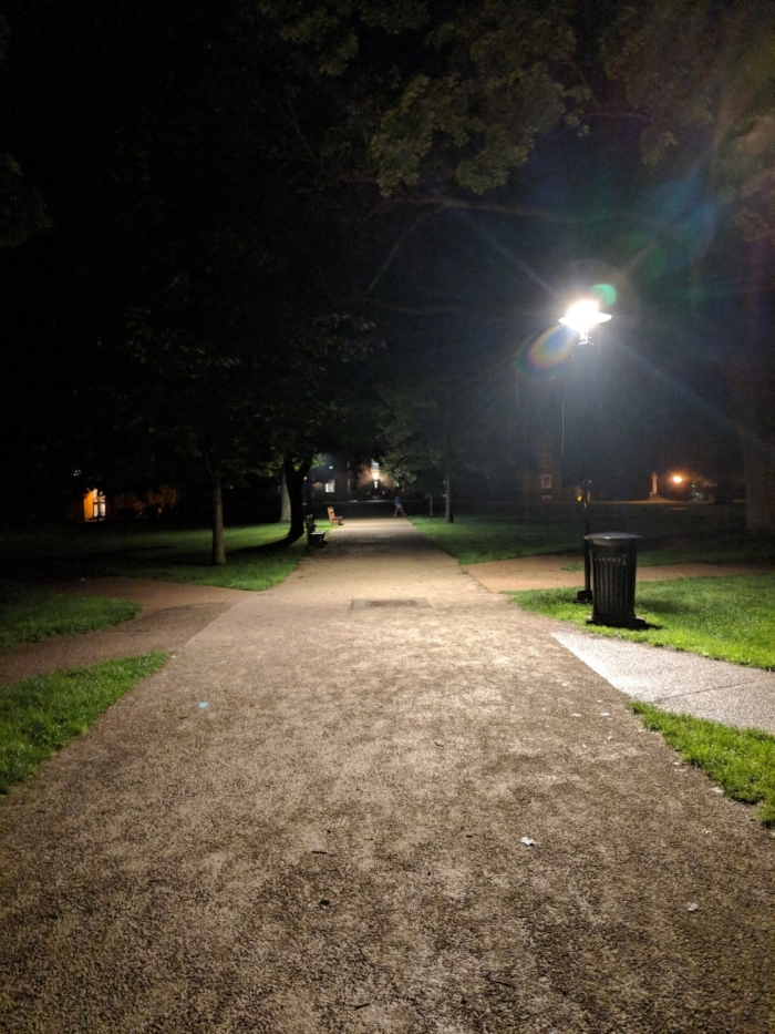 The famous Middle Path, which connects the original Kenyon College buildings to the rest of campus, through the town of Gambier and to the dorms. During the day, there are writers alongside the grass, sprawled in Adirondack chairs, typing on laptops across the benches. During the night, you're alone with your thoughts (and your writing prompts that you haven't finished yet).