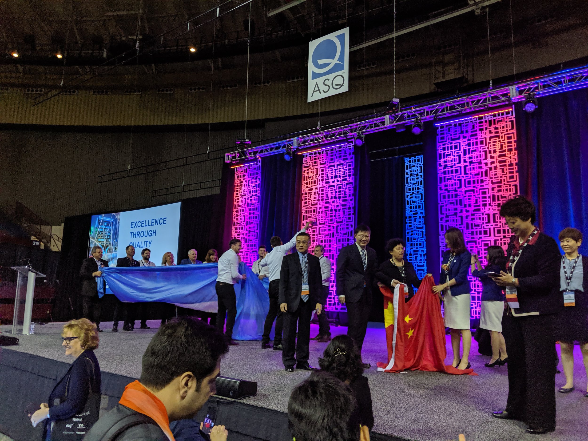 All the finalists and Bronze / Silver / Gold recipients were so enthusiastic and beaming with national pride. Here the Argentinian and Chinese teams post flag waving ceremony for their performance in continuous improvement case studies from their respective companies.