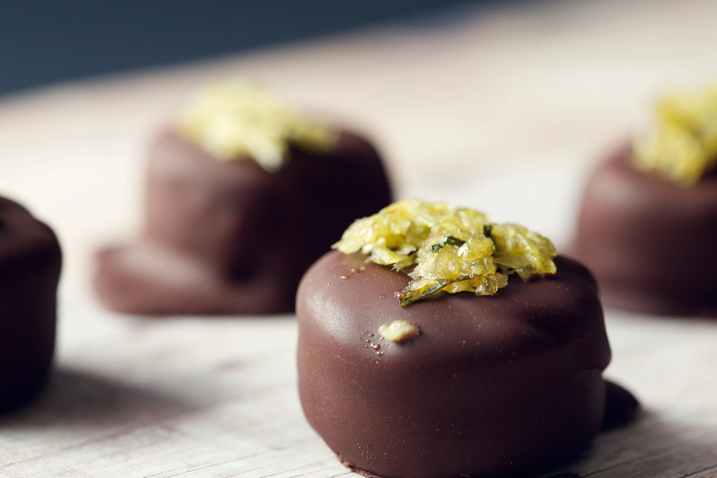 Old Bay Pralines with salted celery garnish