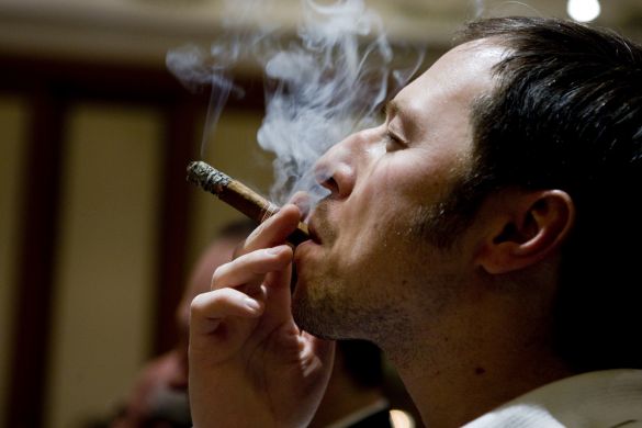 A cigar aficionado taking a puff during Habanos Day in Russia on Thursday. The new Cohiba was also introduced.