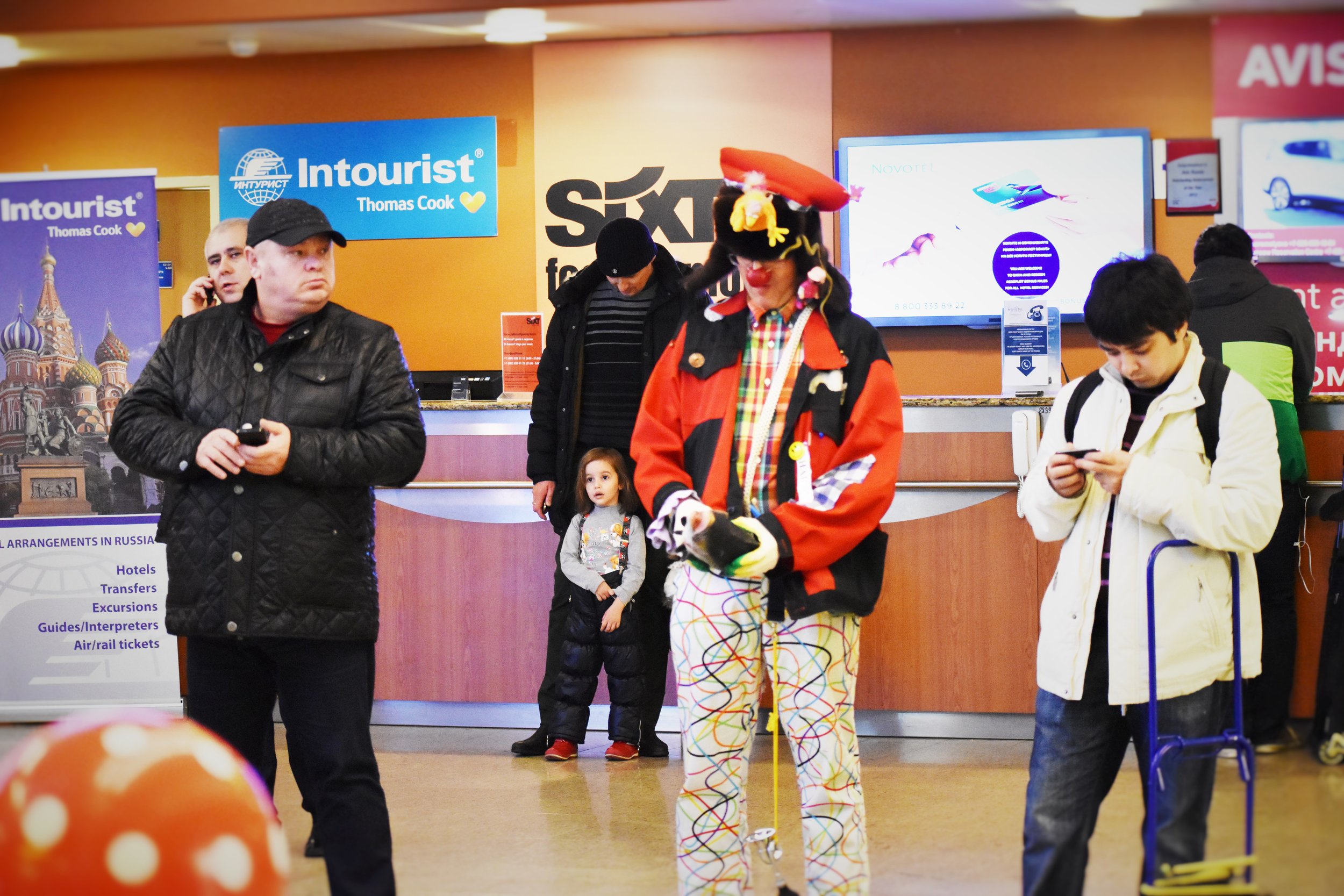  Clowns mixing with locals at Sheremetyevo 