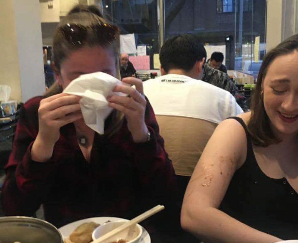 The author (right) and her friend, whose dumpling had just exploded. Photograph by Georgia Wilde.