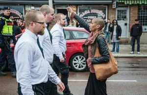Tess Asplund stands with power at a Neo Nazi demonstration in Sweden in 2016. Image credit: Telesurenglish.net