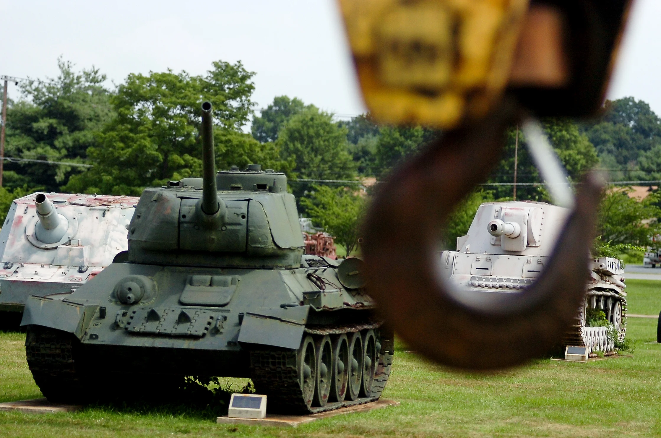 Workers load tanks and heavy artillery onto trucks at the United States Army Ordnance Museum at Aberdeen Proving Ground in Aberdeen, Maryland in preparation to move the museum to Fort Lee in Virginia.