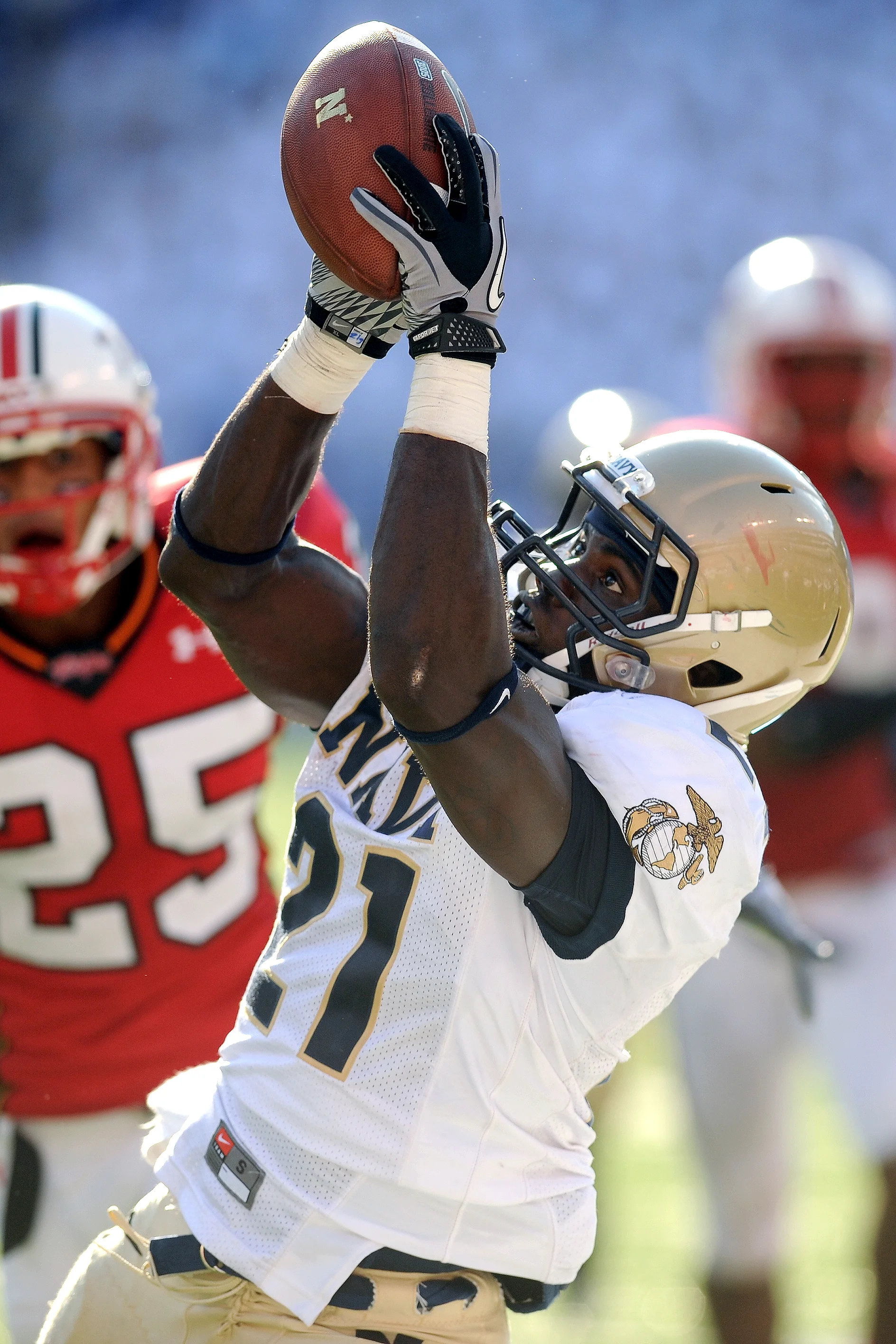 06 September 2010: Navy running back Gee Gee Greene (21) makes a catch for a first down during the second quarter of Monday afternoon's game against Maryland at M&amp;T Bank Stadium in Baltimore, MD. Maryland defeated Navy 17-14. 