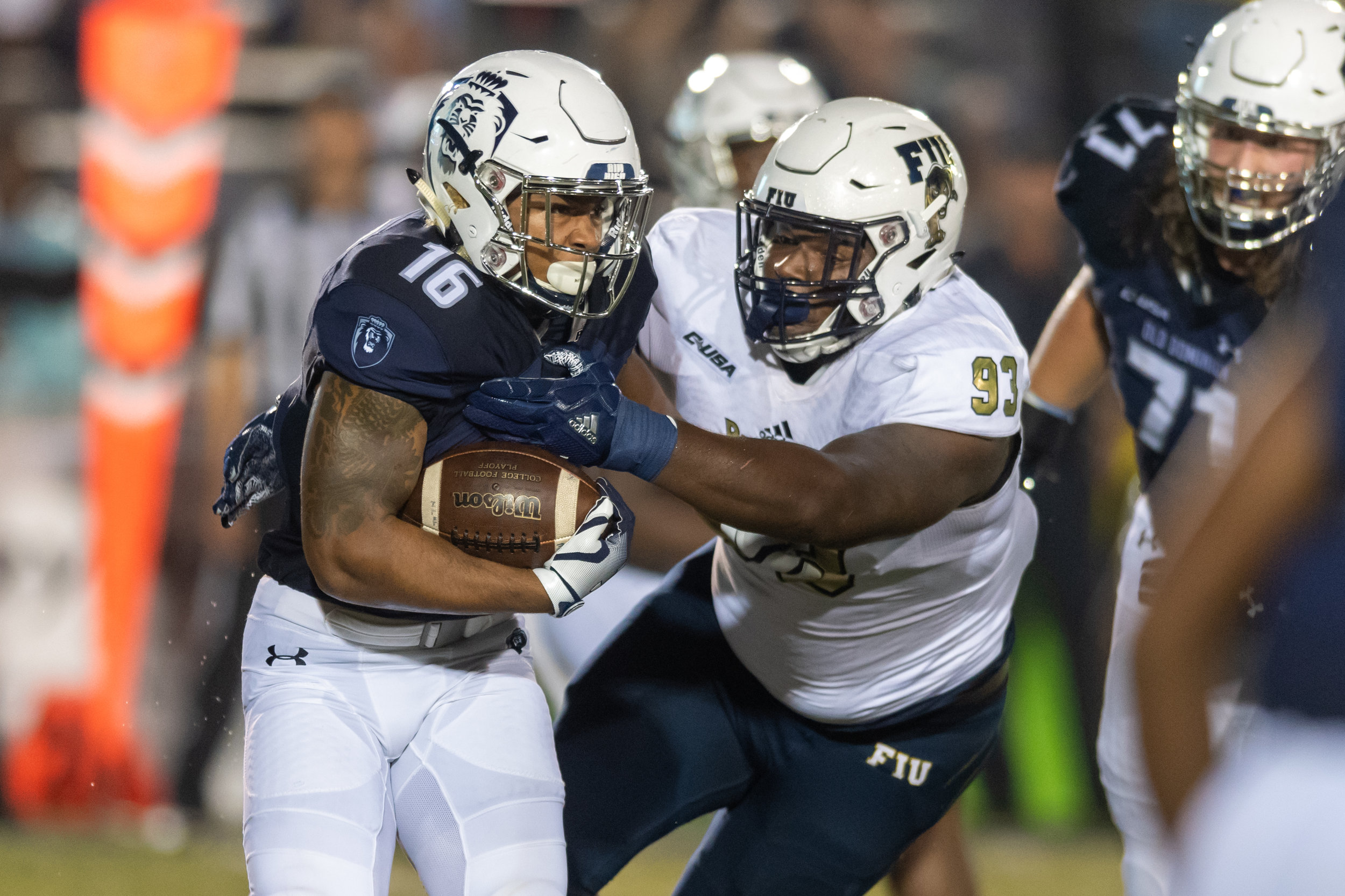  FIU Panthers defensive lineman Teair Tart (93) works to tackle Old Dominion Monarchs running back Brandon Sinclair (16) during the Saturday, Sept. 8, 2018 game held at Old Dominion University in Norfolk, Virginia. The Monarchs lead 14 to 0 during th