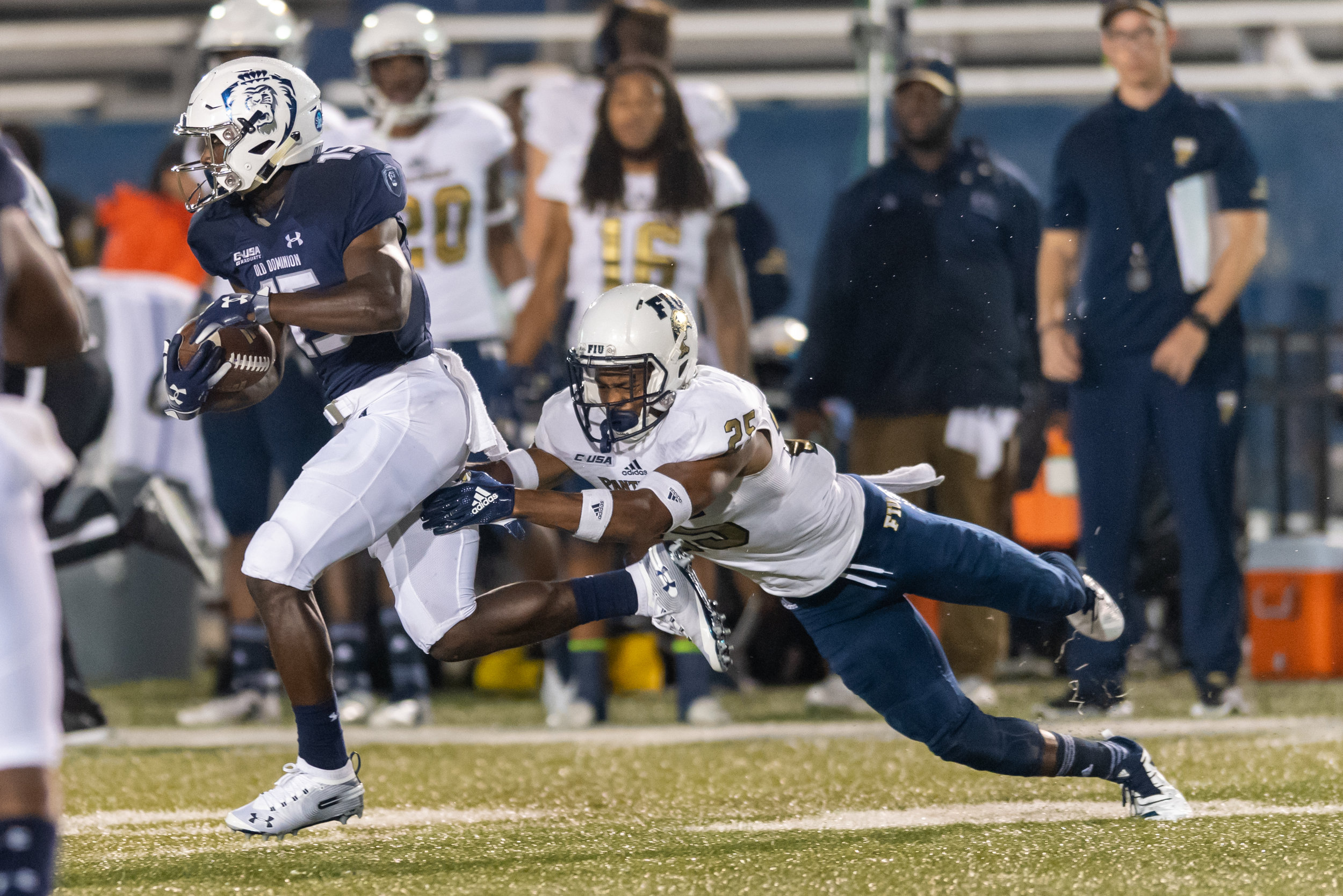  Old Dominion Monarchs wide receiver Isaiah Harper (15) works to escape FIU Panthers defensive back Aris Duffey (25) during the Saturday, Sept. 8, 2018 game held at Old Dominion University in Norfolk, Virginia. FIU defeated Old Dominion 28 to 20. 