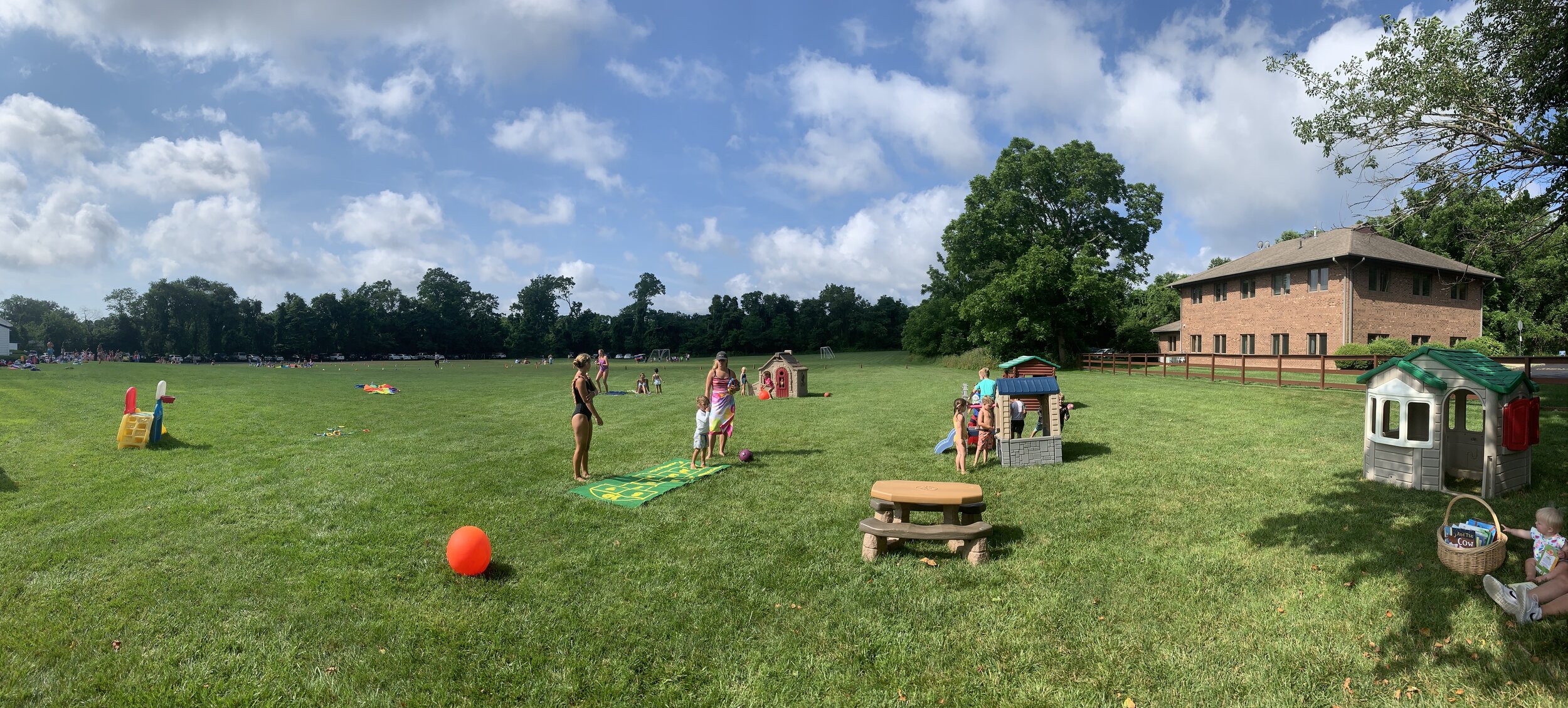Our 3 & 4 year old students enjoying some unstructured fun in our field!