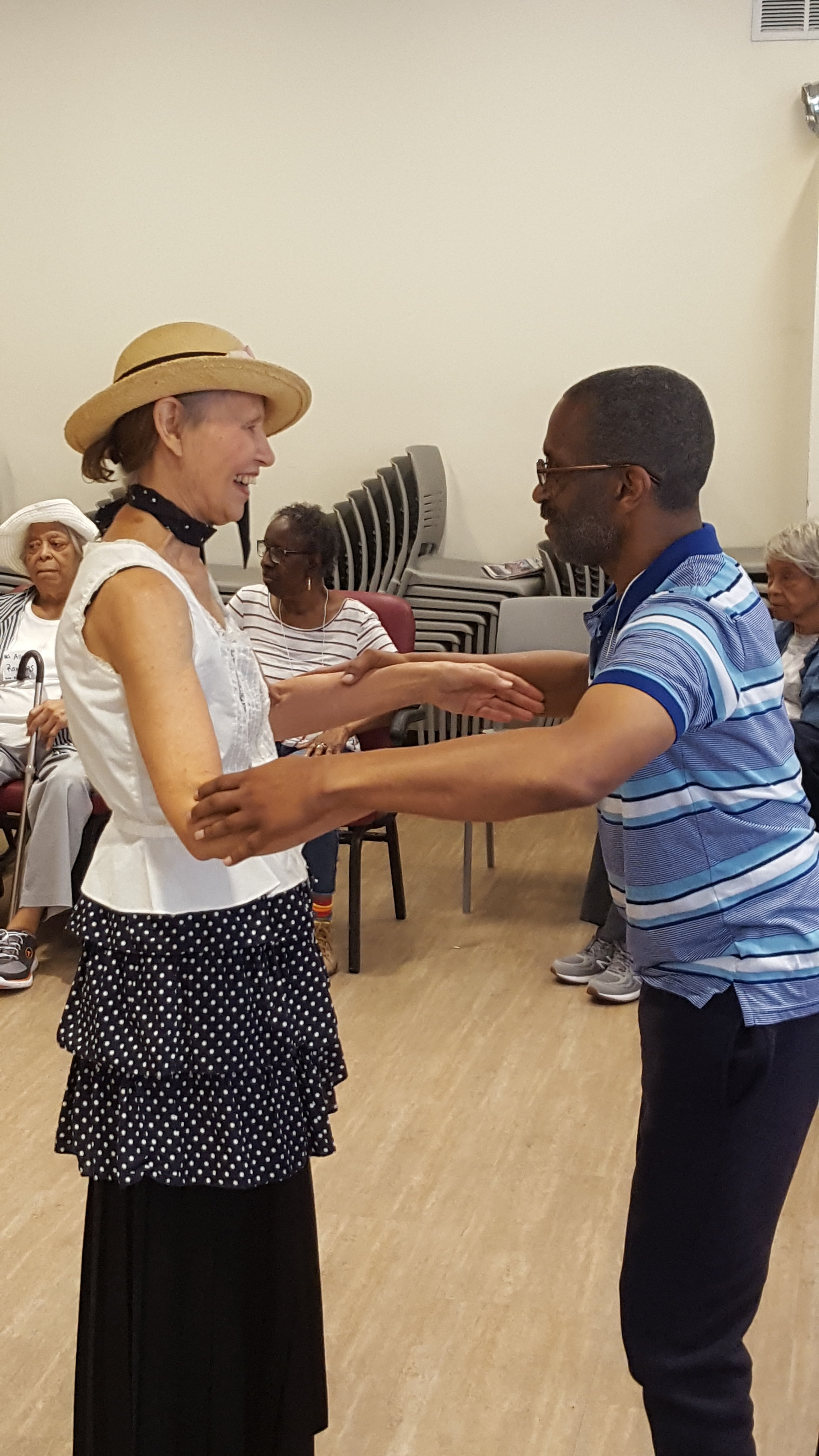  Tango Mercurio volunteer Carol Cichowski connects with a participant (photo by Flora Le) 