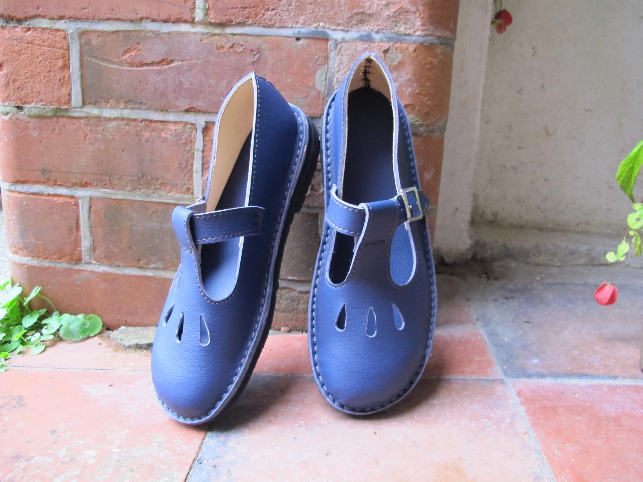 blue vegan shoes_Tbar_Green_shoes_with cut outs.JPG