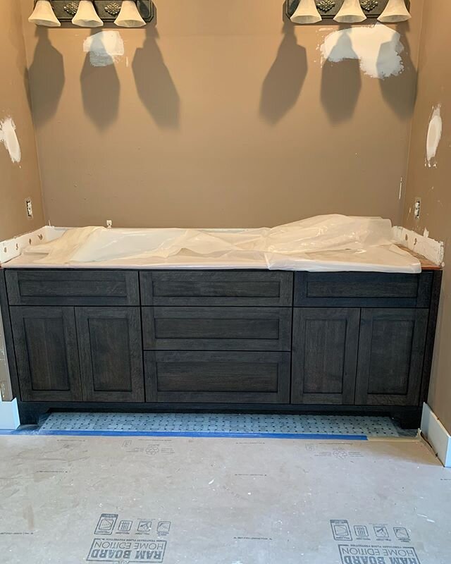 Here are a few more progress shots of this bathroom remodel. I built the vanity and most all of the trim in the room is shop made.