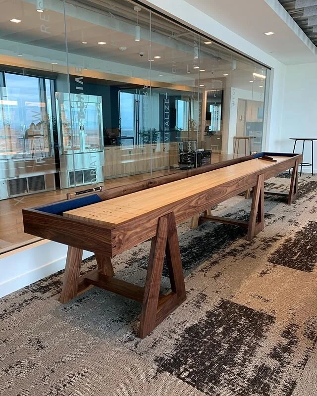 18&rsquo; walnut shuffleboard table. Hard maple playing surface and brass hardware on the scorekeepers. This one was built in two pieces so it could fit in an elevator. Designed by Adam @pitchandburl and built by my shop.