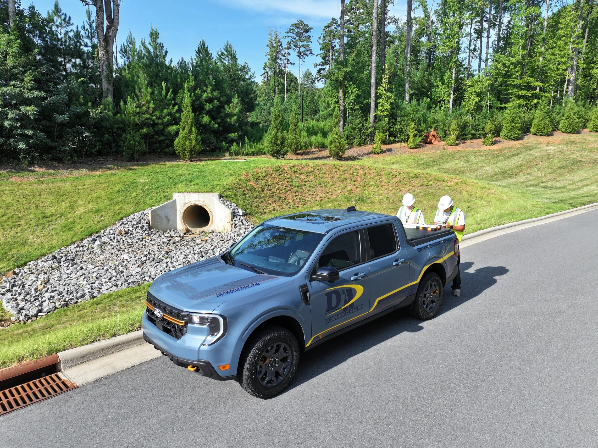 Work Truck In Action w Hambright Backround.JPG