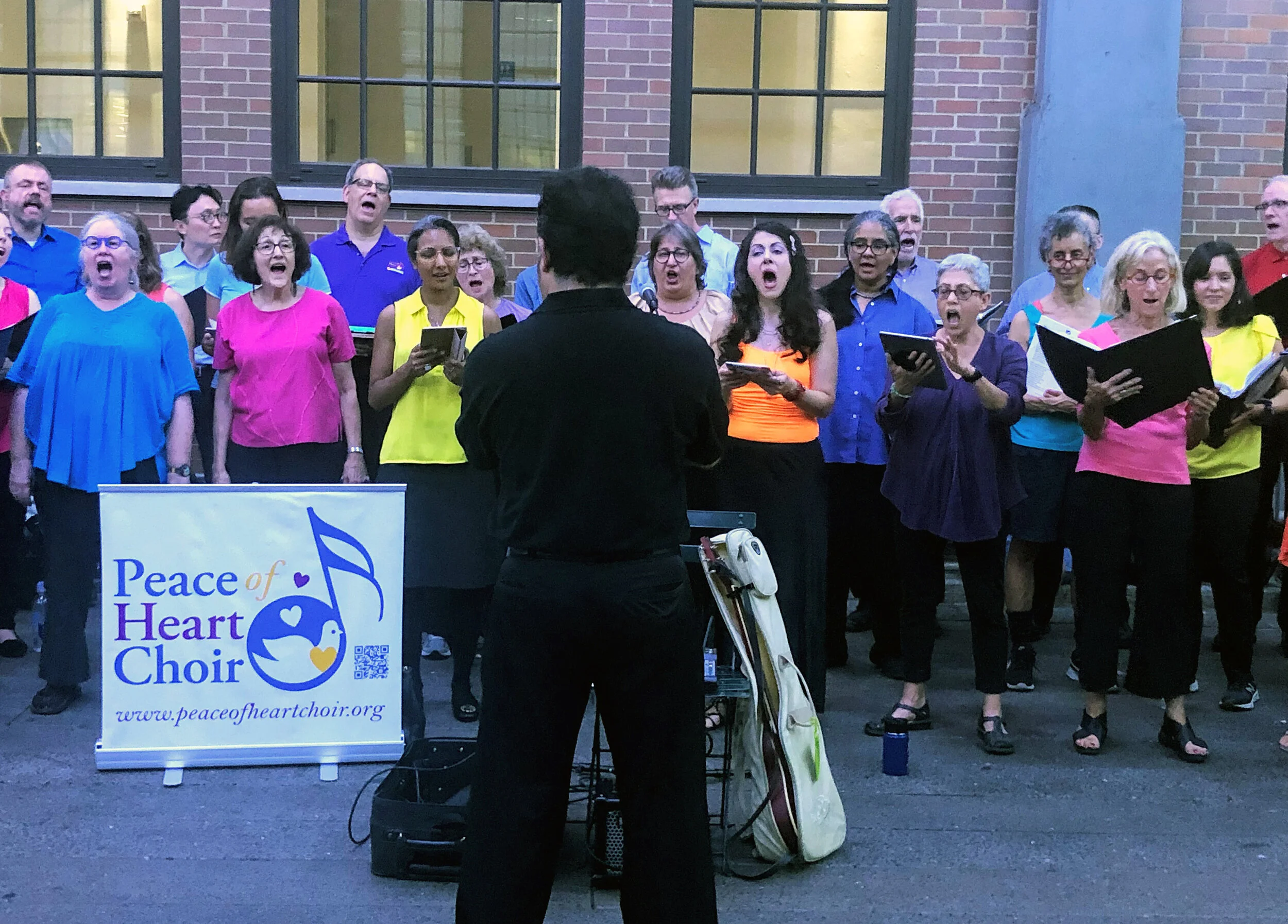 Our maestro, René Galván, conducts the choir.