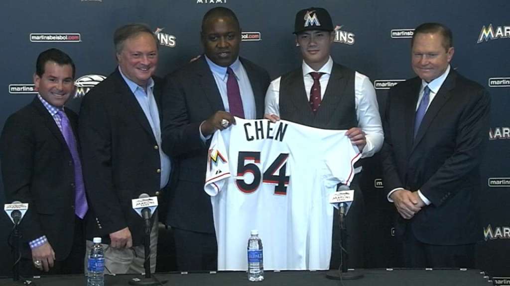 David Samson (left) pictured with Scott Boras (right) after Marlins signed Wei-Yin Chen (Credit: mlb.com)