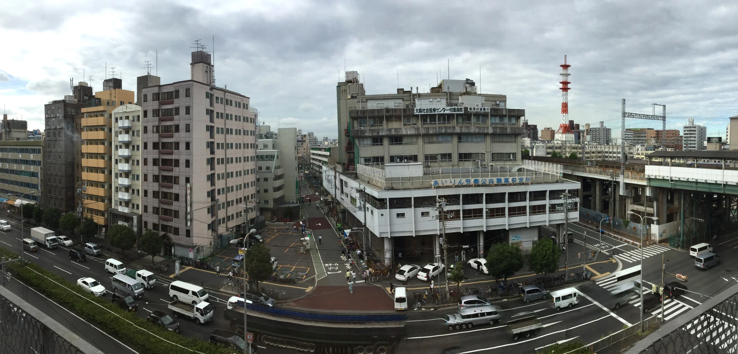  View from the Hostel. All along the skirtings of the building lay Japans homeless. I was struck by the reality of this...I watched a man rummage through the bins each evening only for it all to be cleaned by morning.