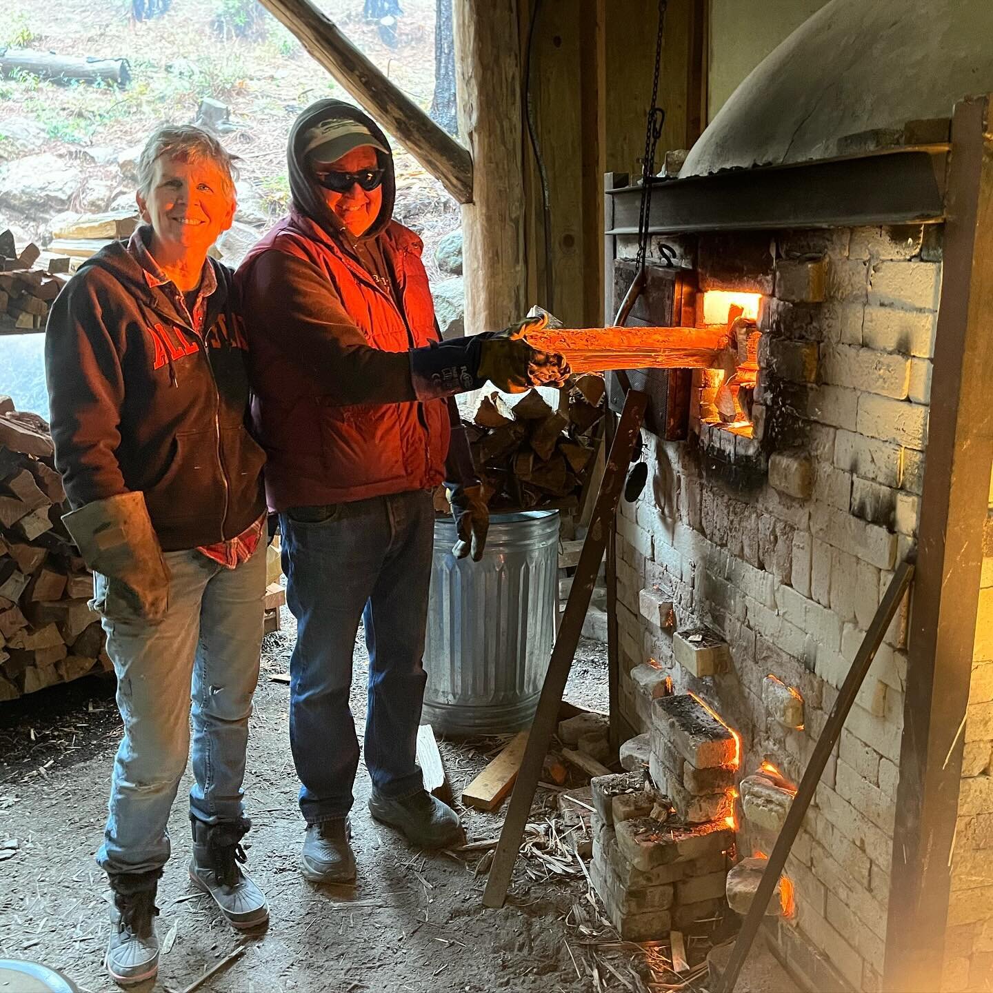 Lots of fun stoking the train kiln @cobbartandecology . This is Michelle and Scott&rsquo;s first wood fire and their instincts are very good! 🔥🧡#woodfiredceramics #cobbartandecologyproject #trainkiln