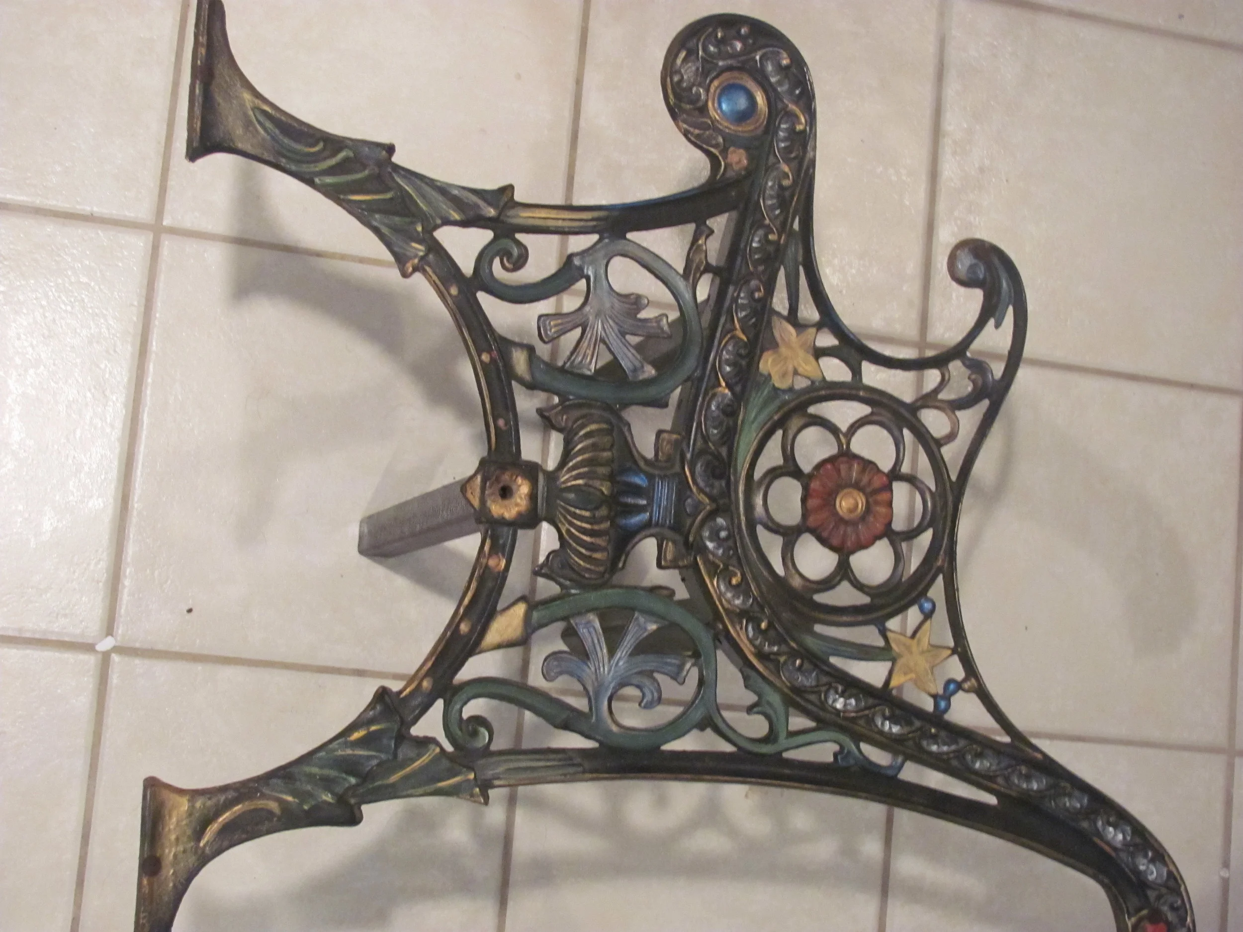 Wrought iron bench, legs welded on... 