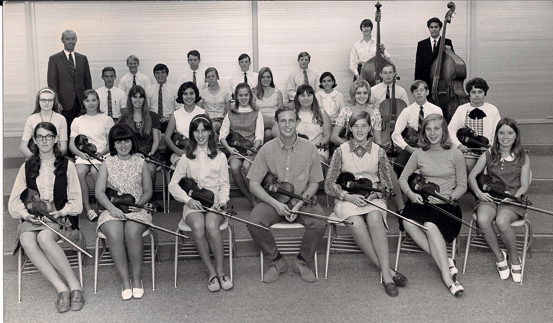 Director Hugh Wallace with Hoover Orchestra in Rehearsal Hall at Hoover