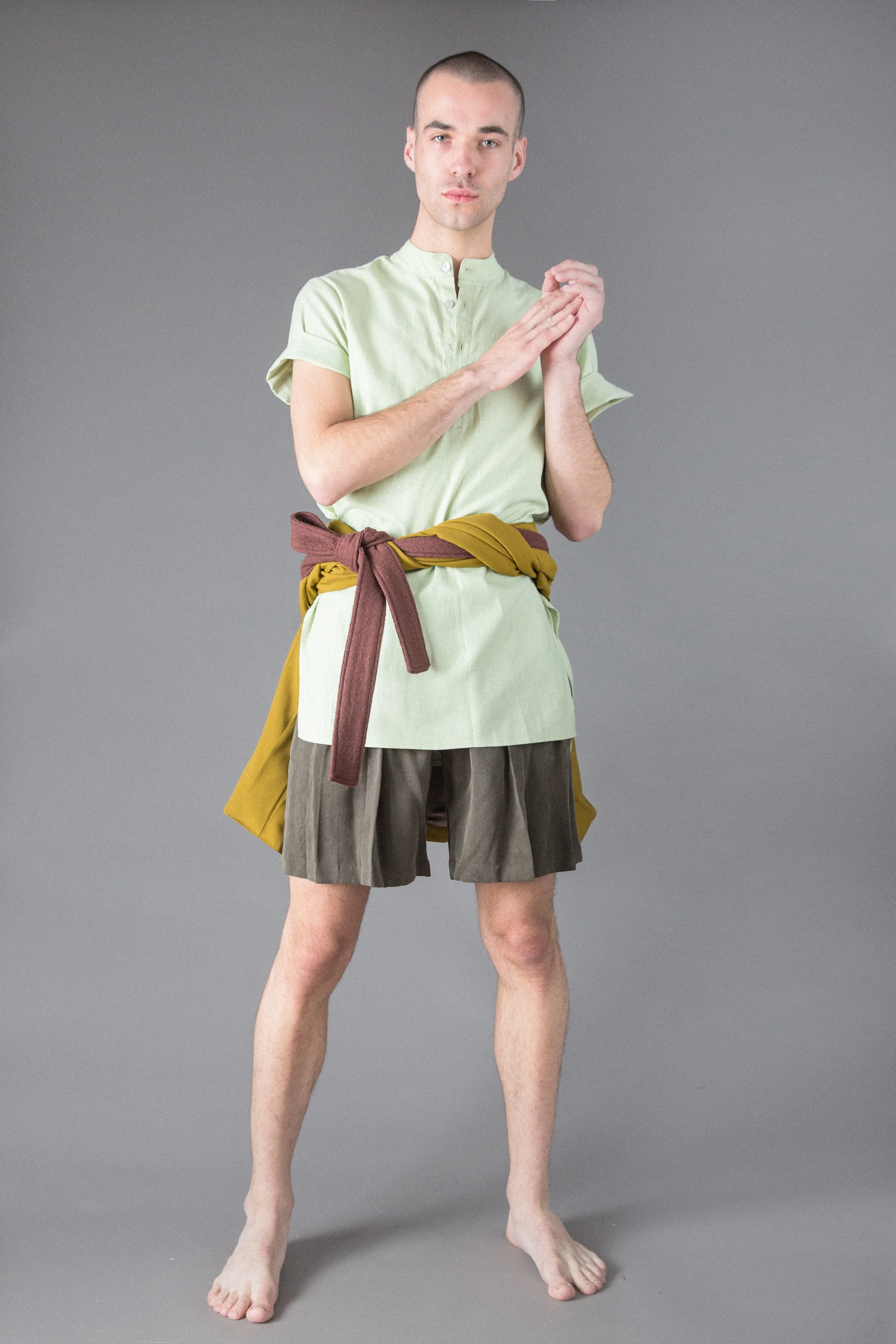 pleated cotton canvas jacket, linen tunic, tensel shorts