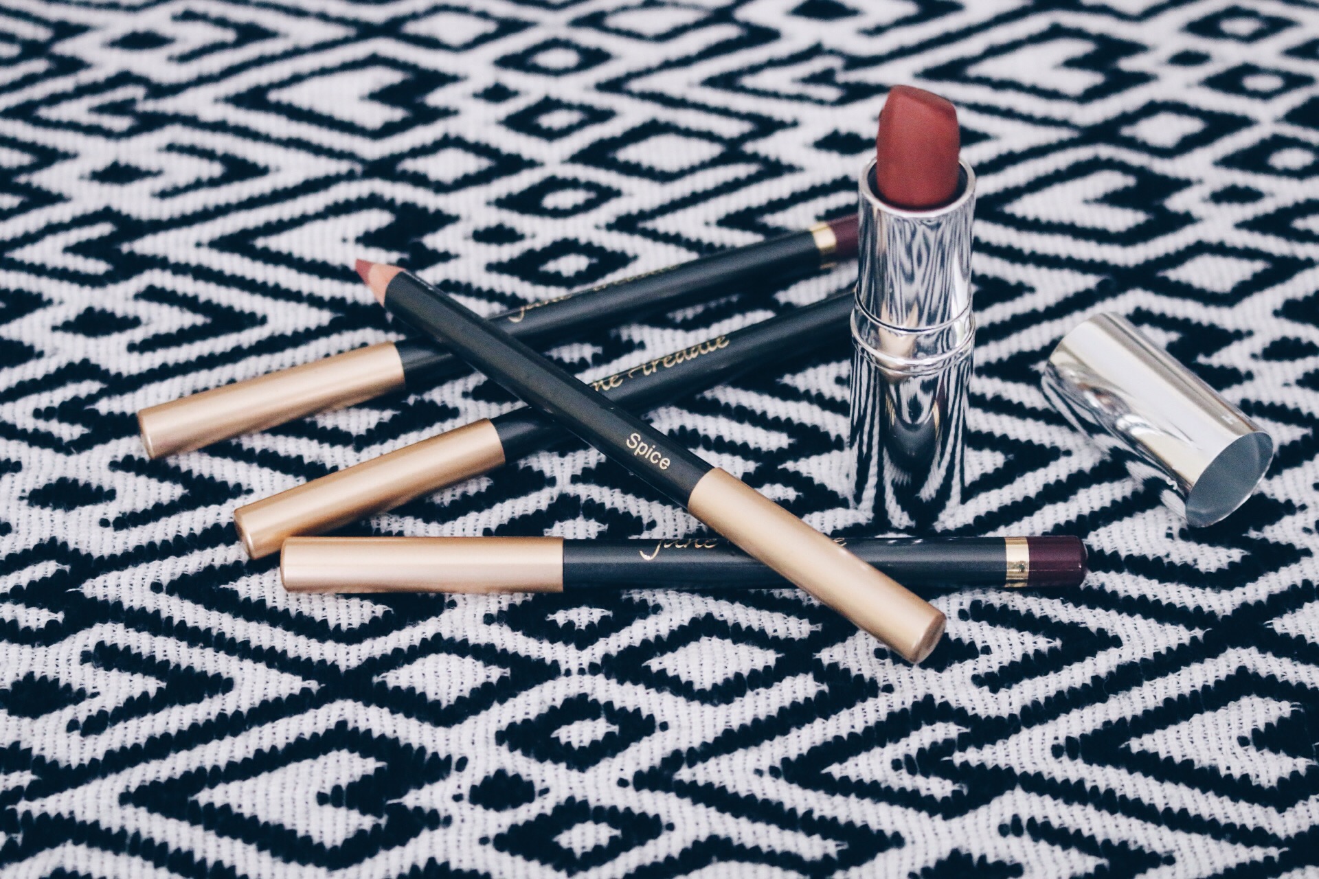 JANE IREDALE LIP PENCIL IN "SPICE" (TOP), "SIENNA," "NUDE," AND "BERRY" AND VMV HYPOALLERGENICS VELVET MATTE LIPSTICK IN "GILDA"